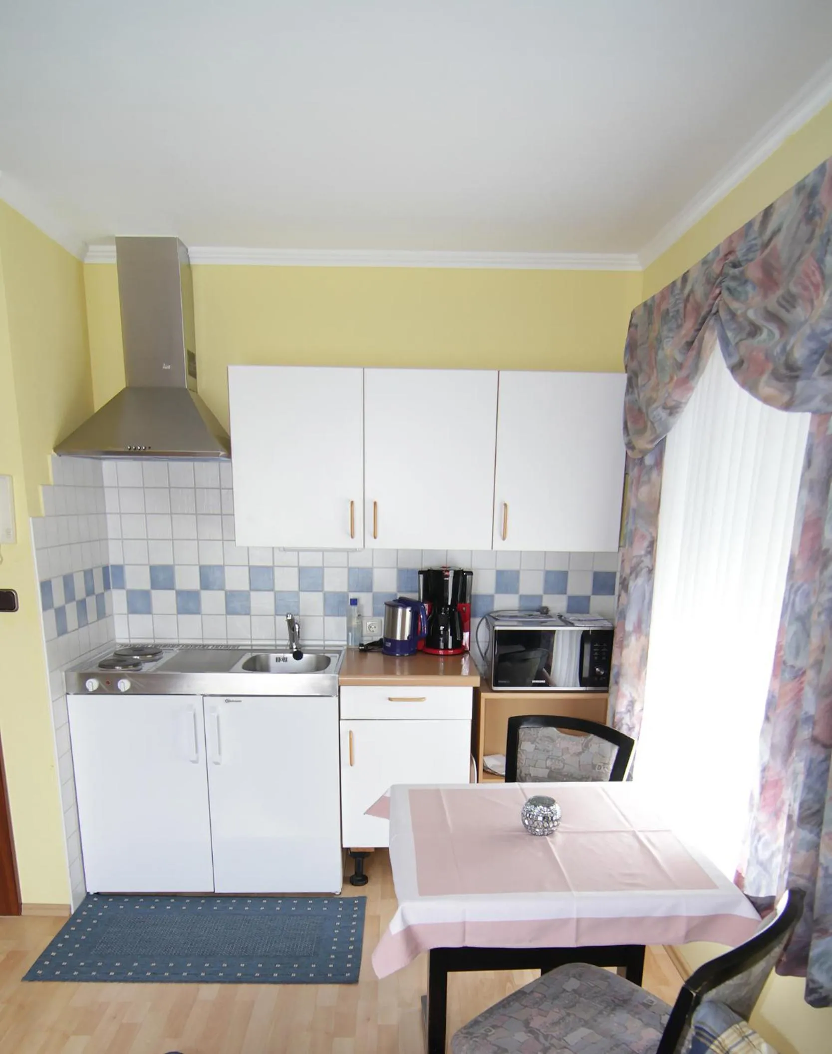 Kitchen or kitchenette in Appartements am Kurpark
