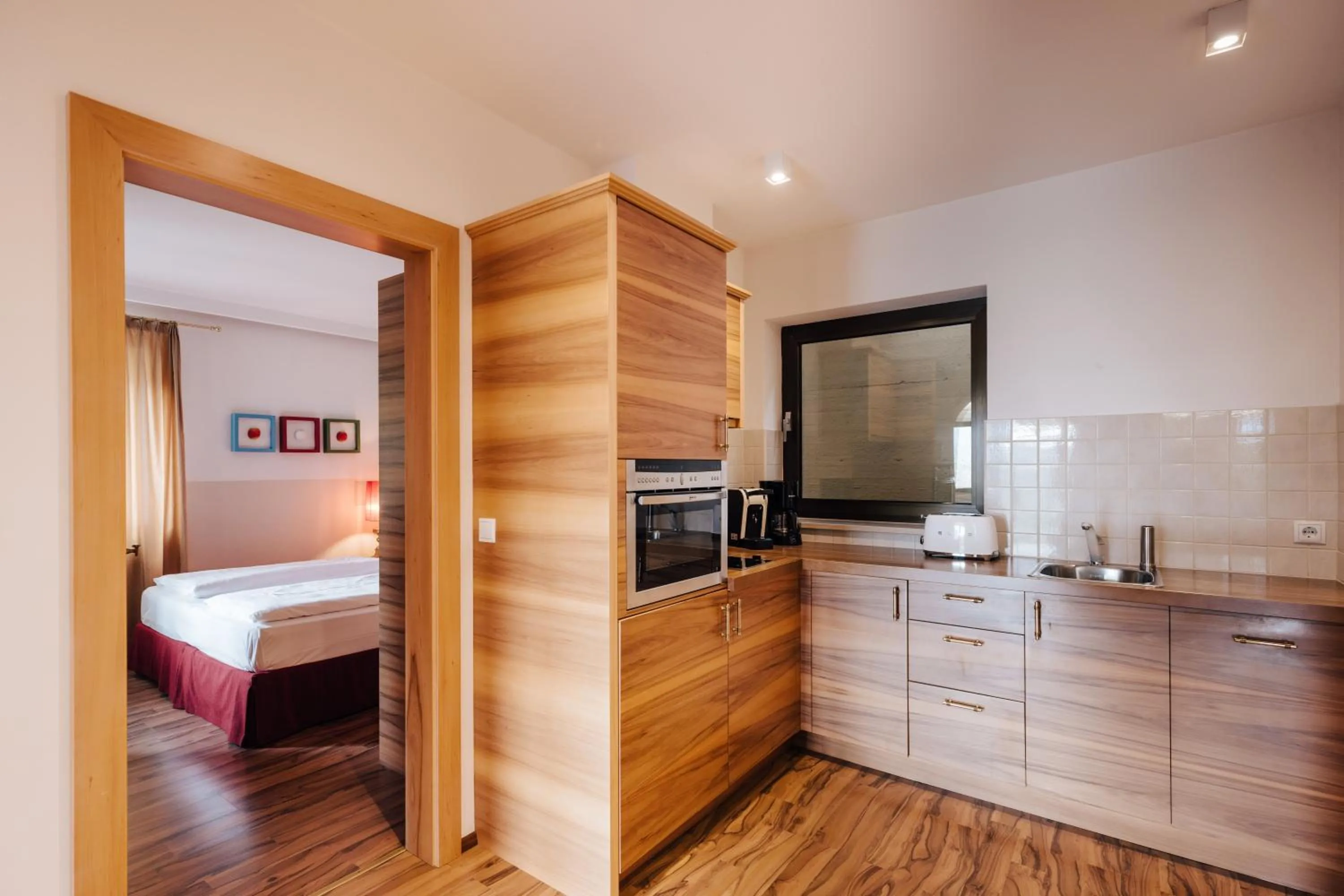 Kitchen or kitchenette, Bed in Apartments Bachmair