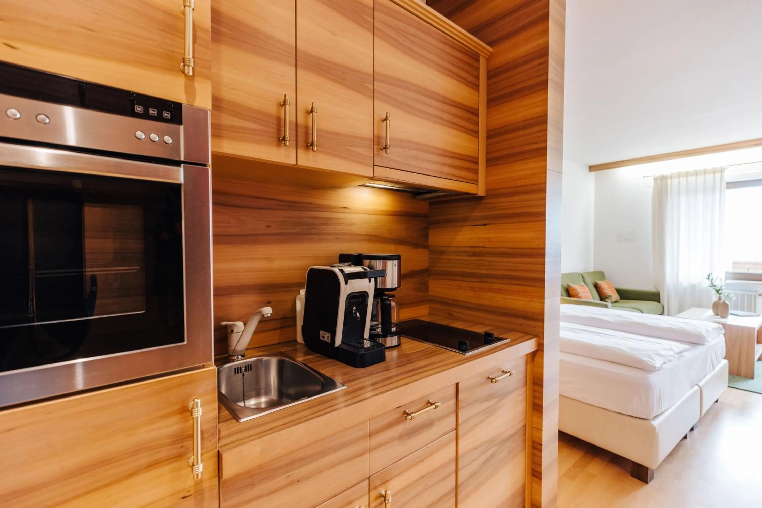 Kitchen or kitchenette, Bed in Apartments Bachmair