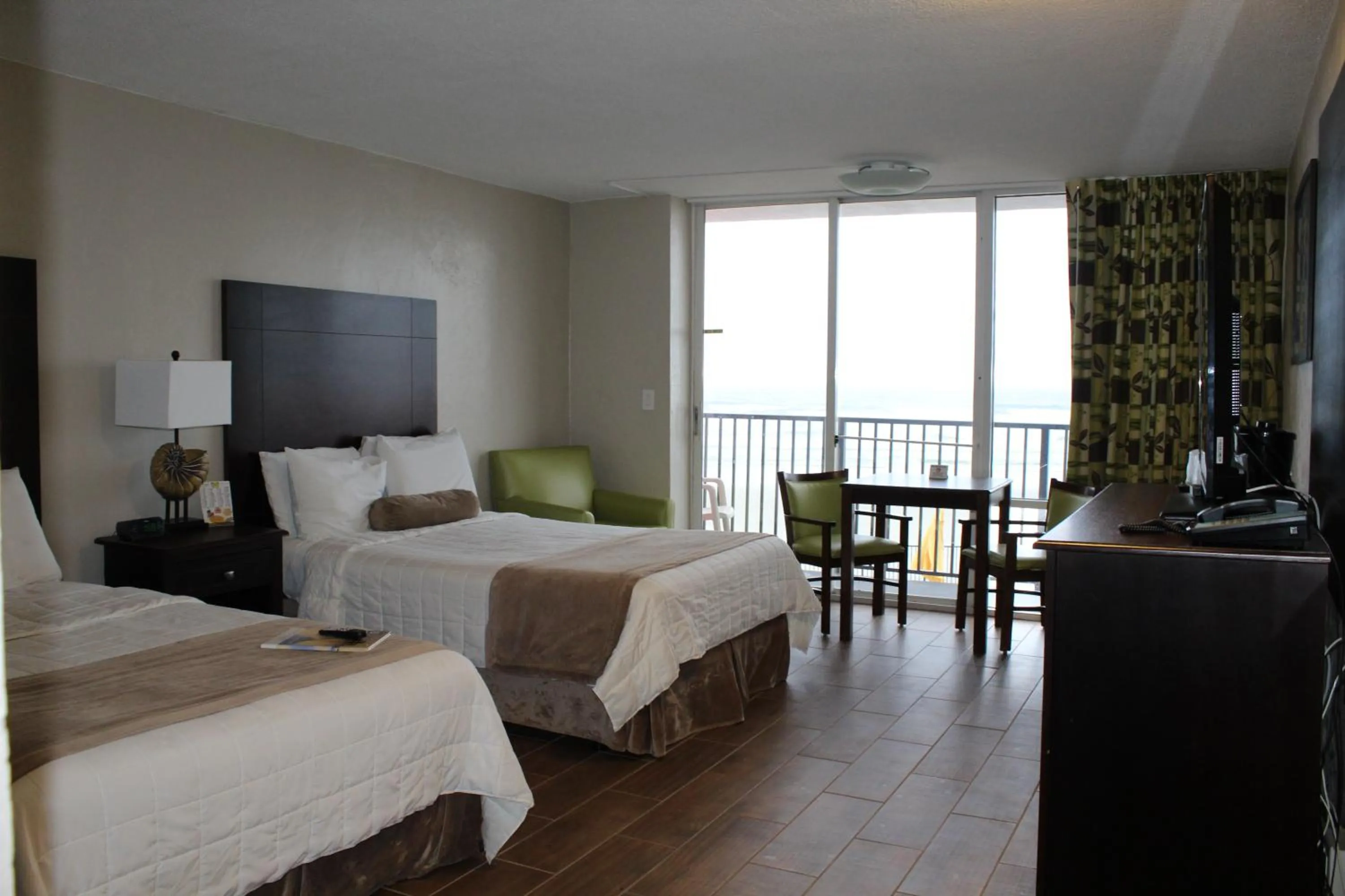 Bed in Cove Motel Oceanfront