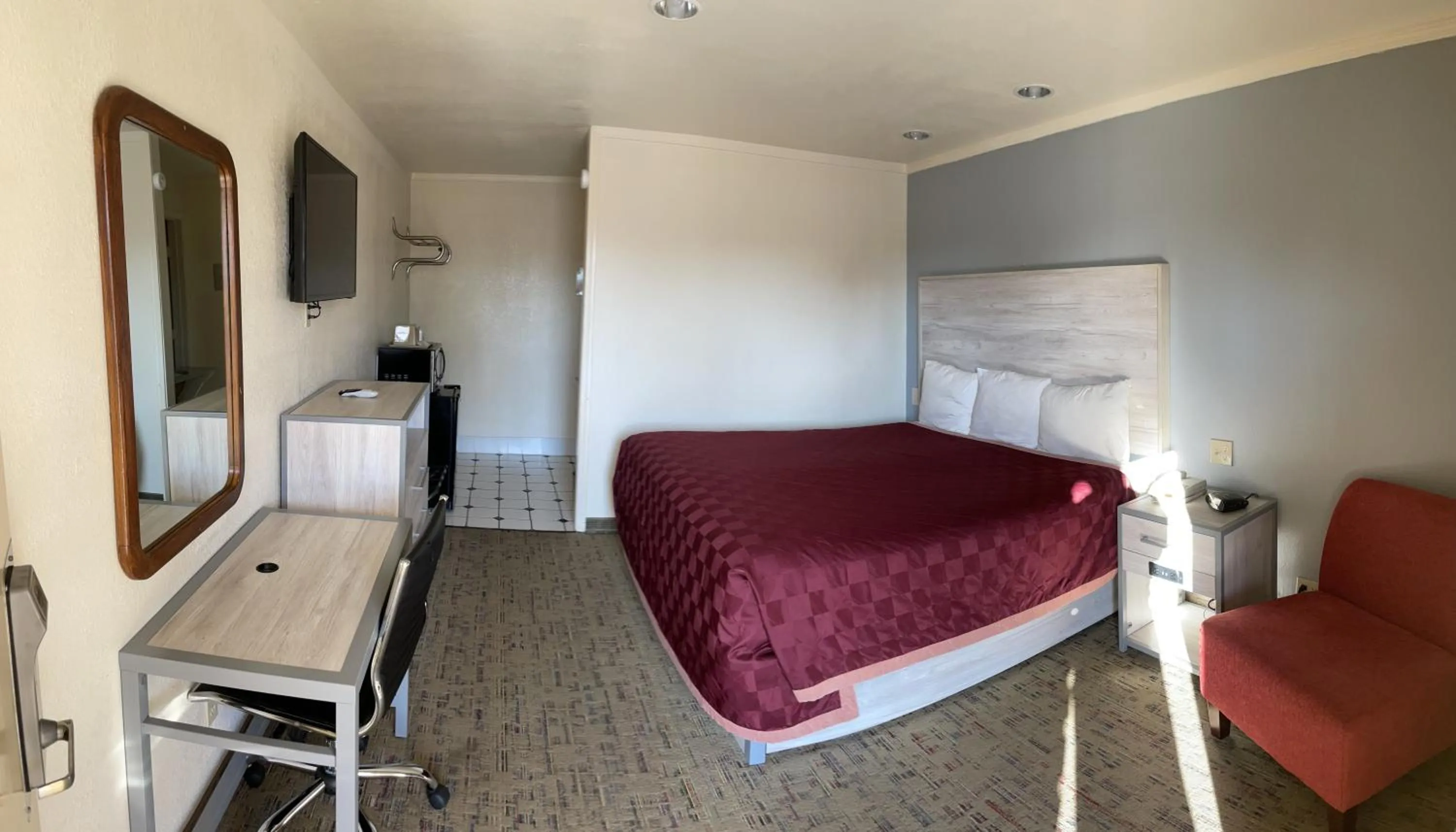 Bed in Antlers Budget Inn