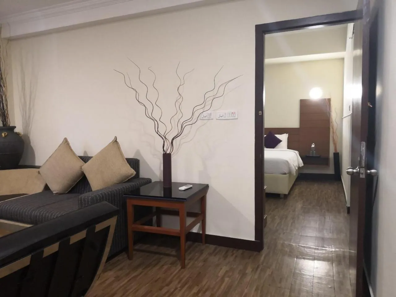 Living room, Bed in Presidency Kochi City Centre
