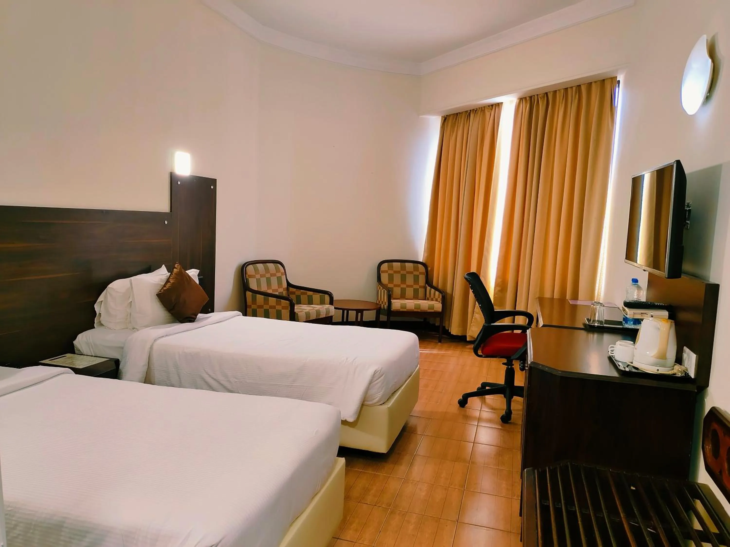 Bedroom, Bed in Presidency Kochi City Centre