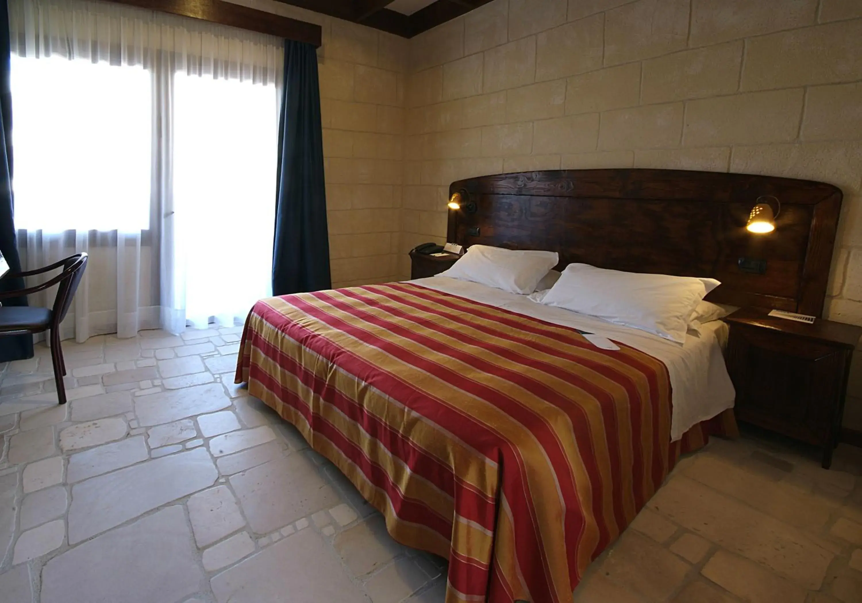 Bed in UNA HOTELS Regina Bari Bed in UNA HOTELS Regina Bari