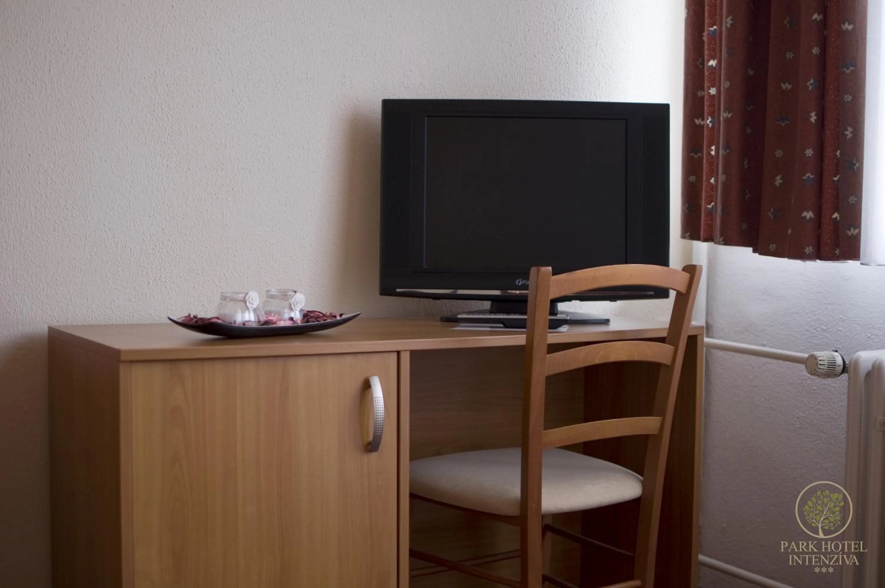 Decorative detail, TV/Entertainment Center in InterSport Hotel