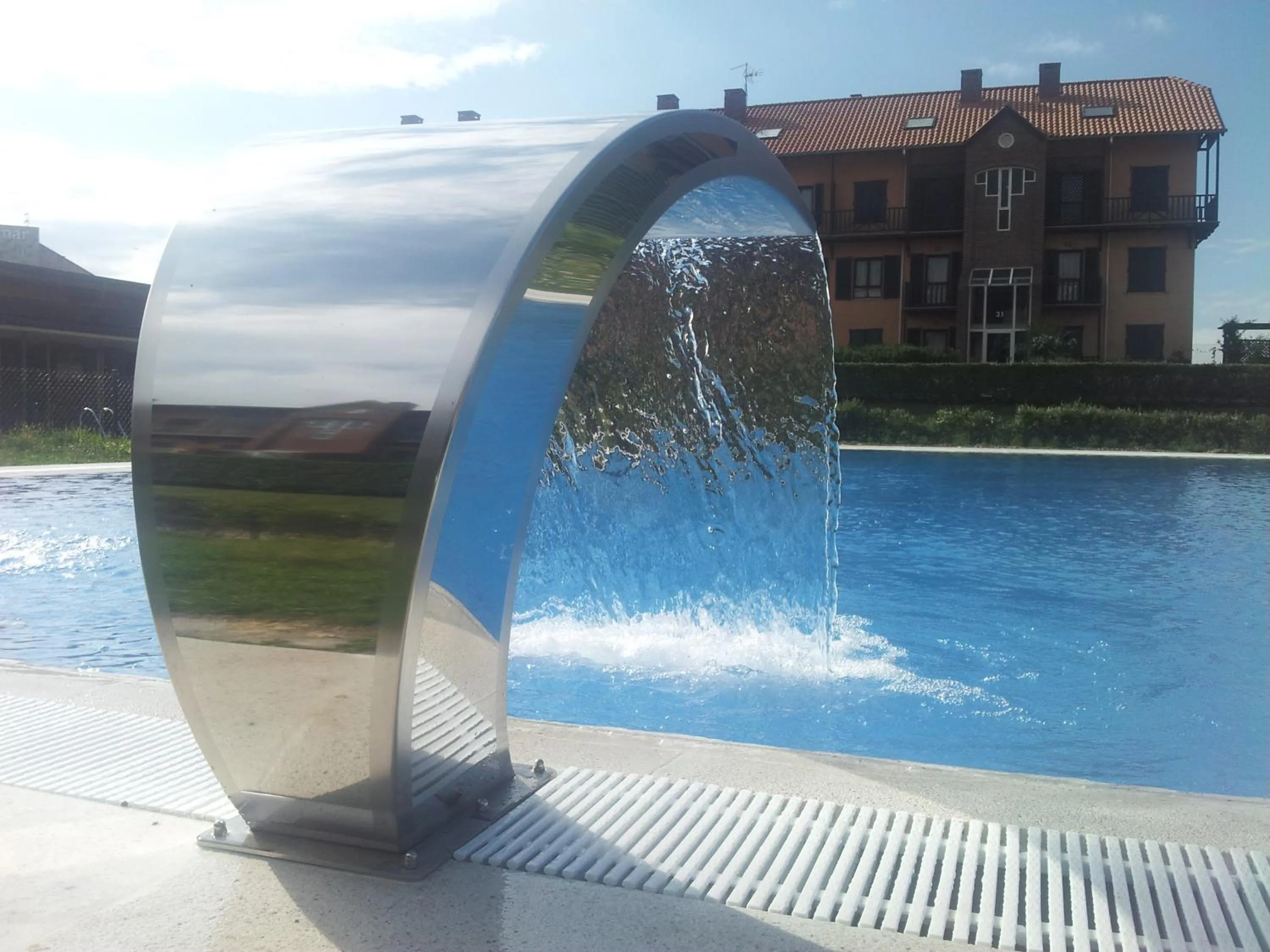 Swimming pool in Abba Comillas Apartments