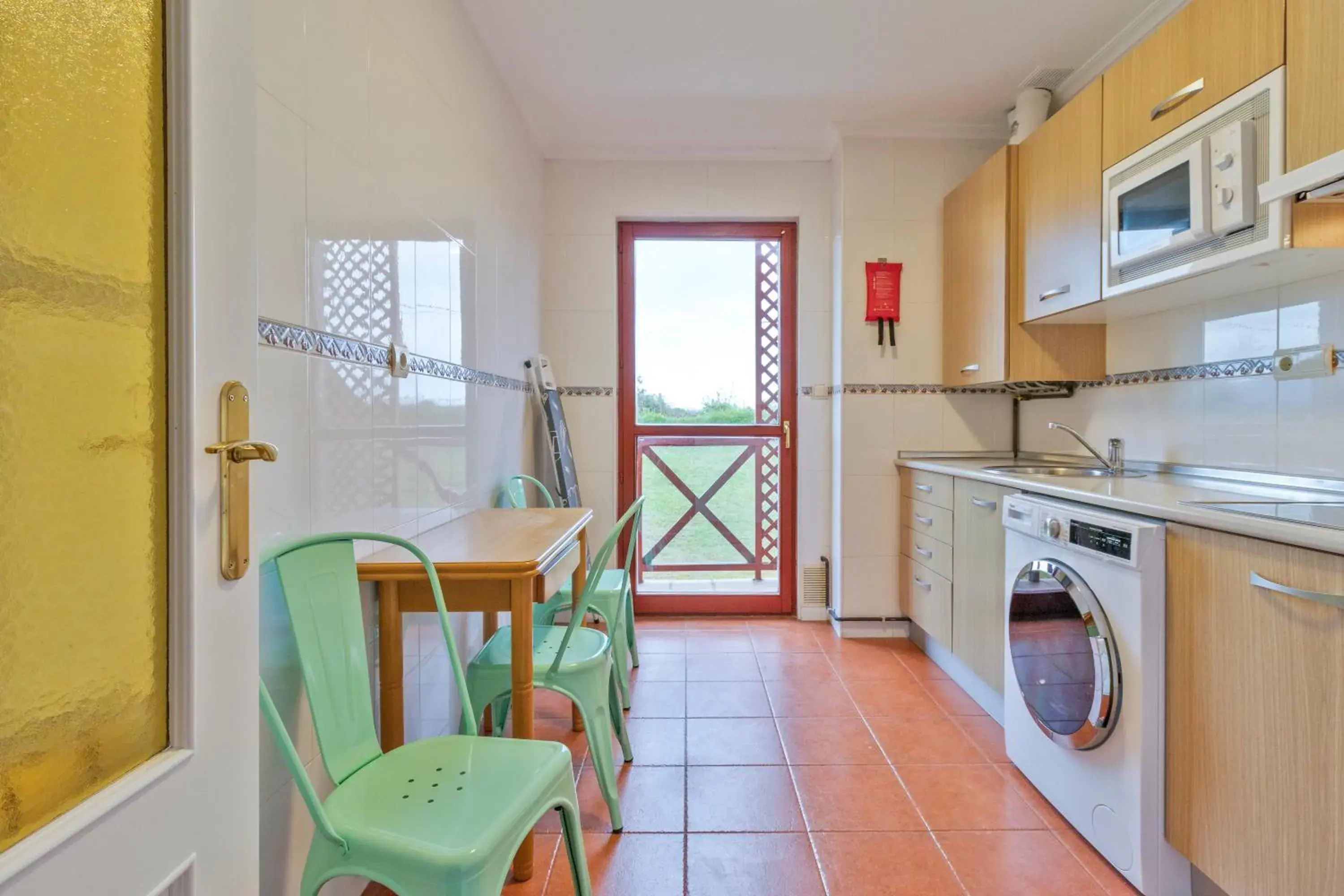 Kitchen or kitchenette in Abba Comillas Apartments Kitchen or kitchenette in Abba Comillas Apartments