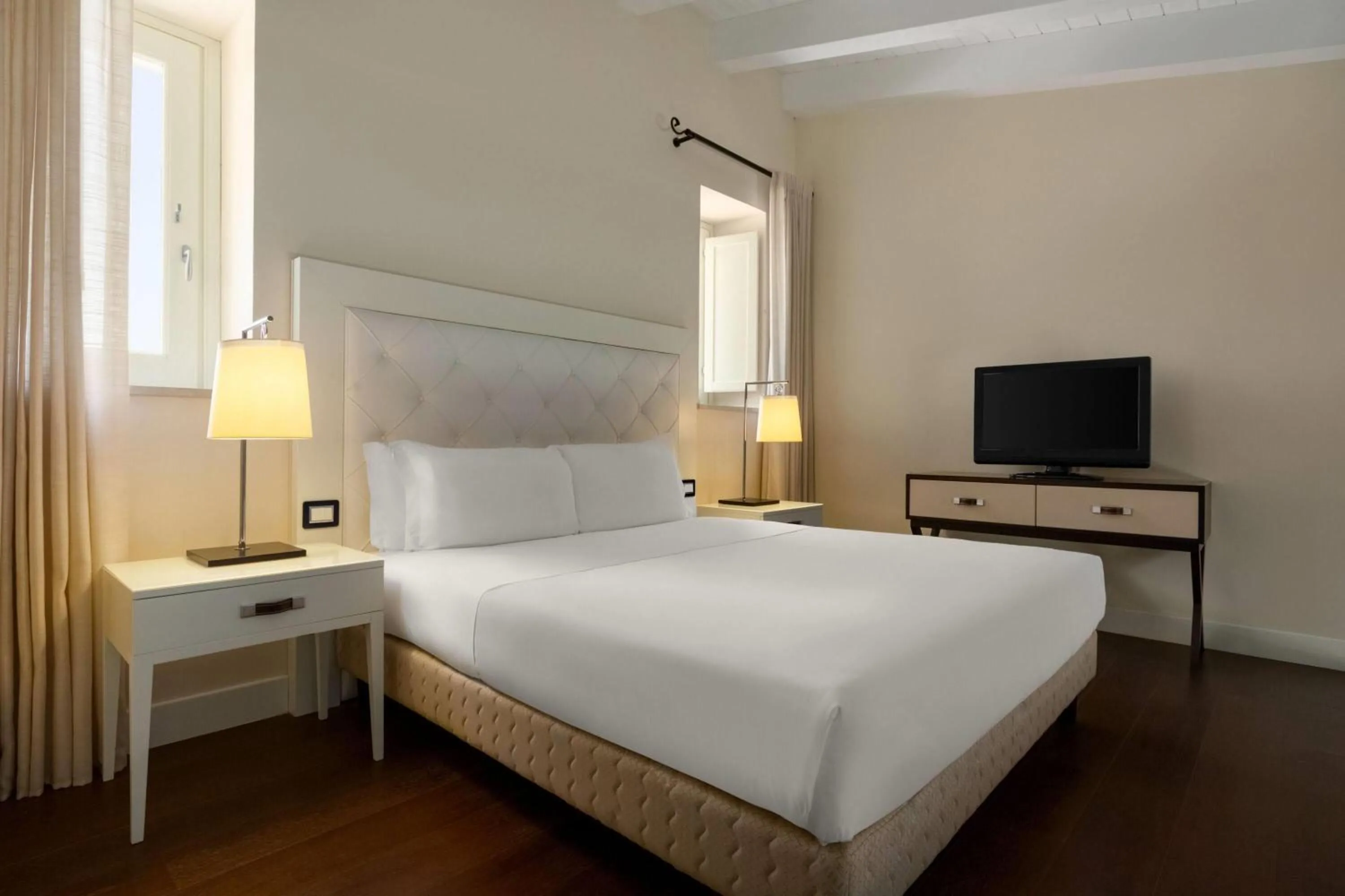 Photo of the whole room, Bed in Dolce by Wyndham Siracusa - I Monasteri Golf & Spa