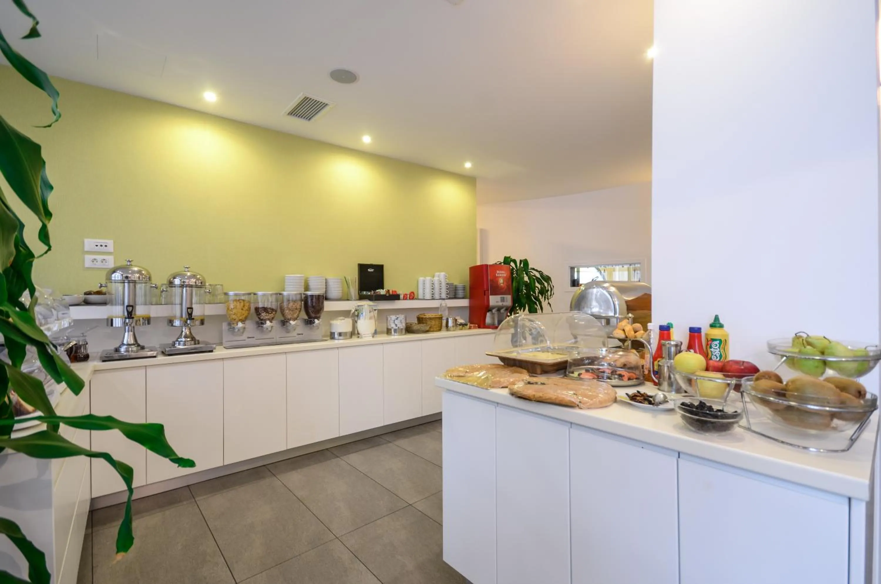 Kitchen or kitchenette in Xenia Hotel