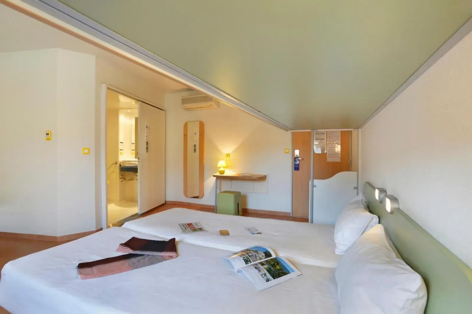 Bed in First Inn Hotel Bed in First Inn Hotel