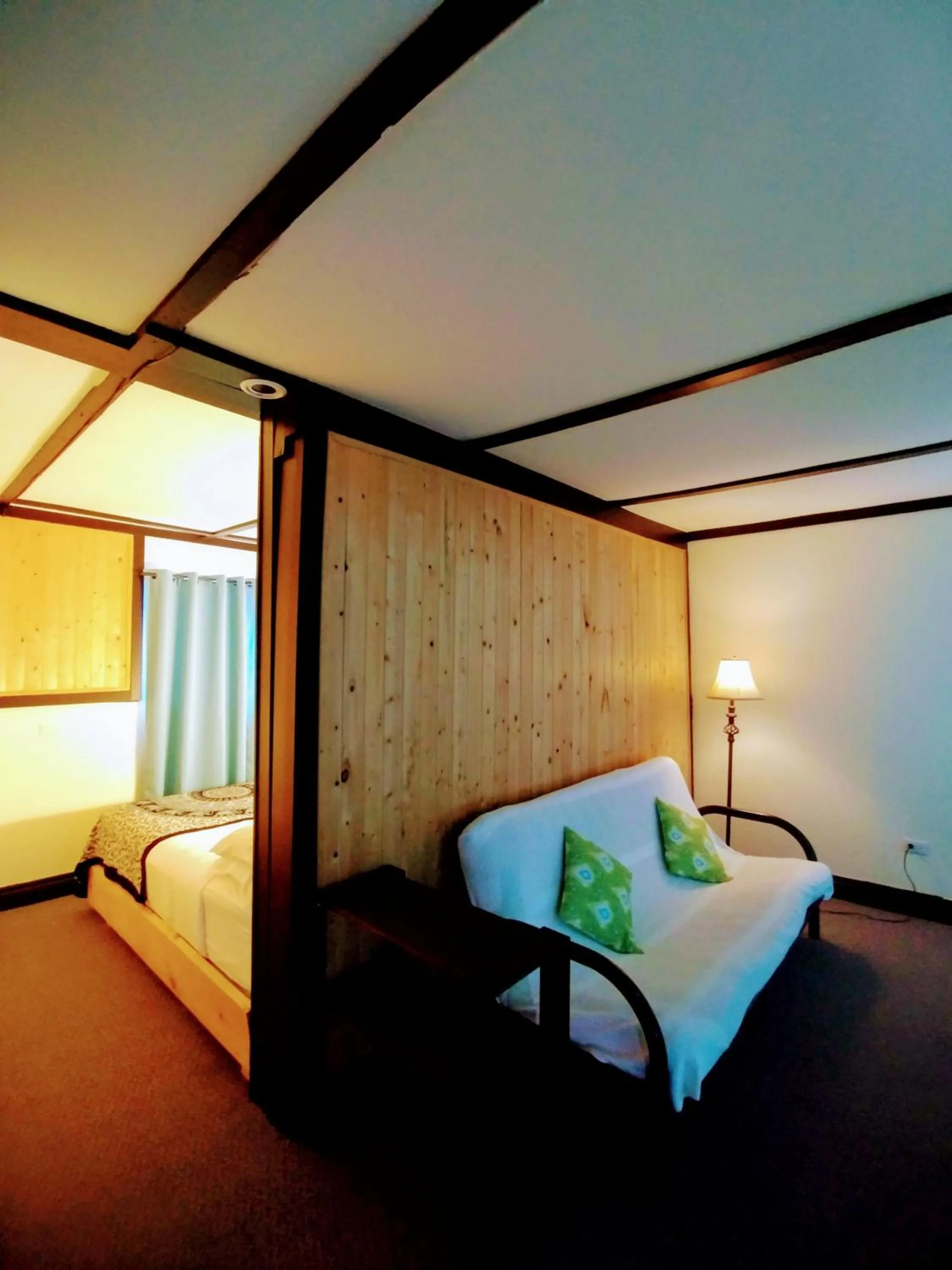 Bed in Dwight Riverside Inn