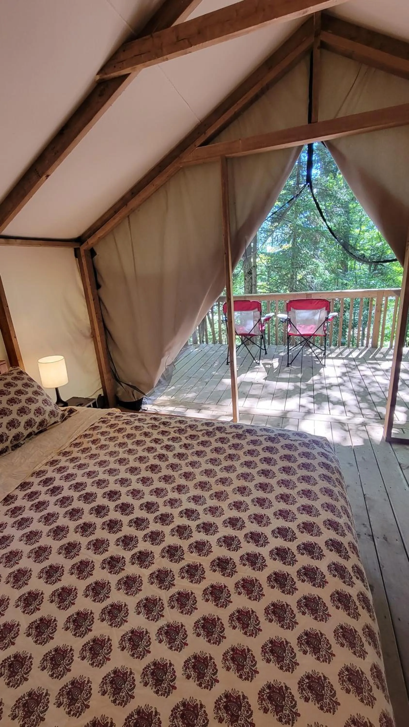 Bed in Dwight Riverside Inn