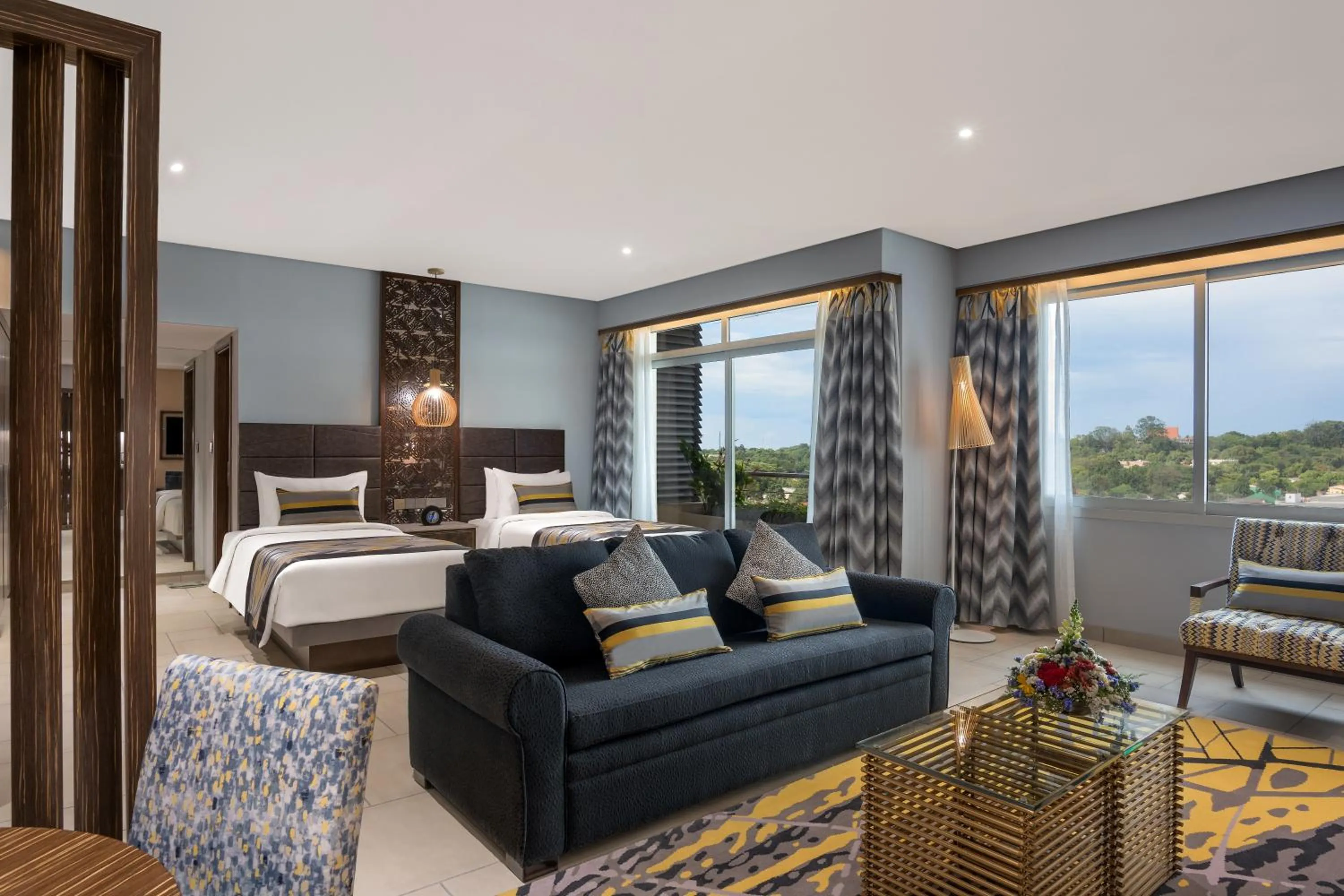 Living room, Bed in Neelkanth Sarovar Premiere