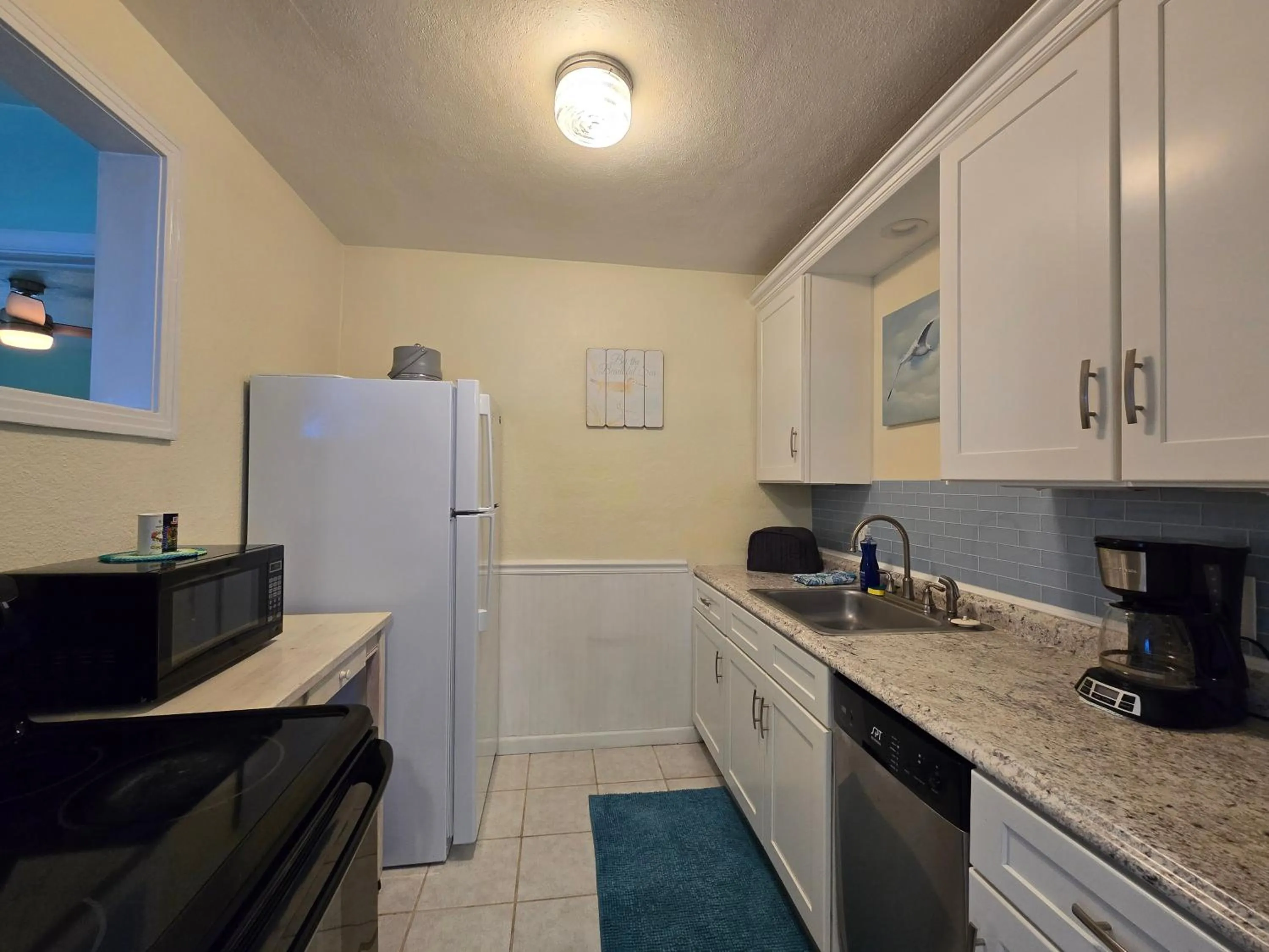 Kitchen or kitchenette in Oceanfront Sea Scape Motel