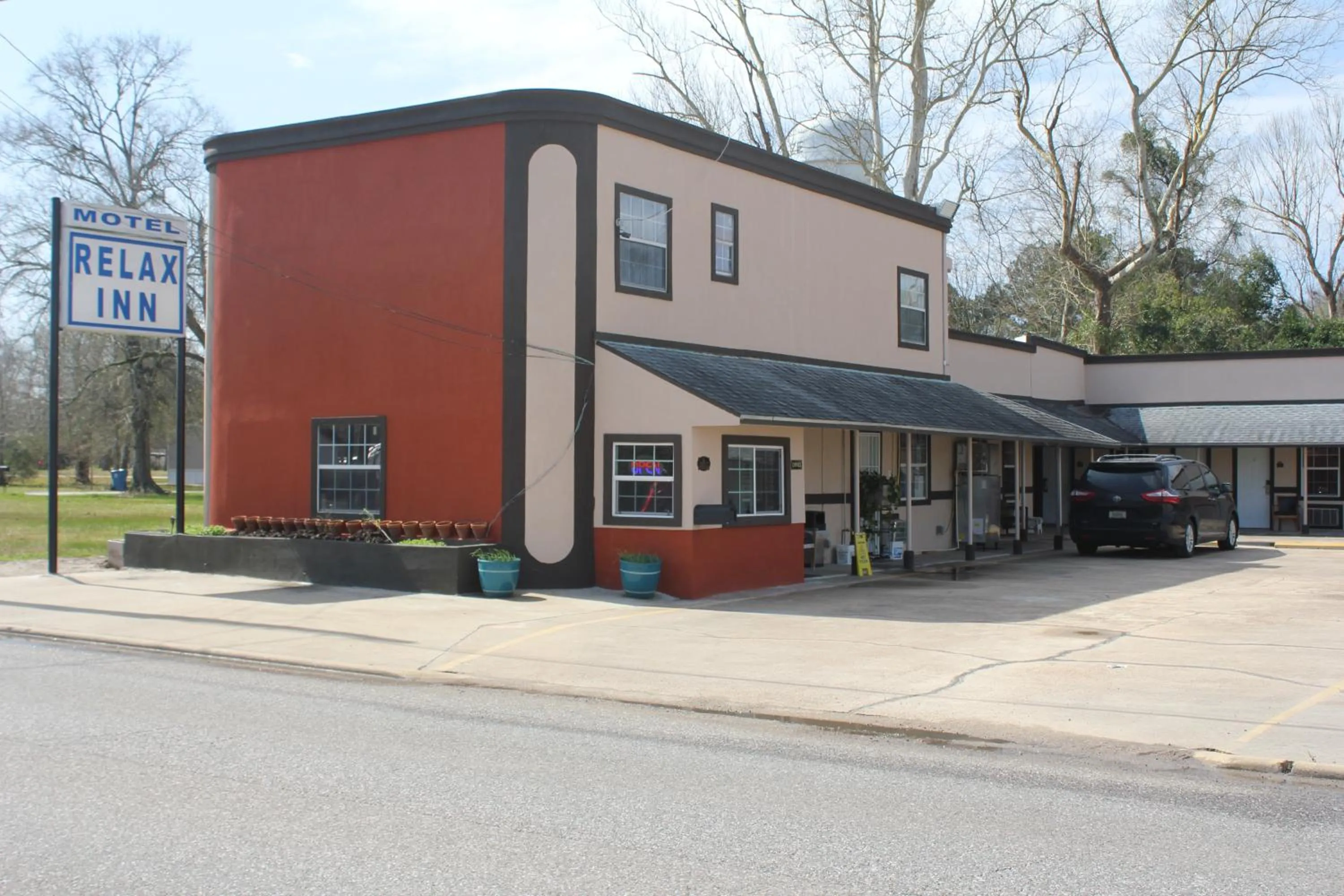 Property logo or sign in Relax Inn Motel Kountze