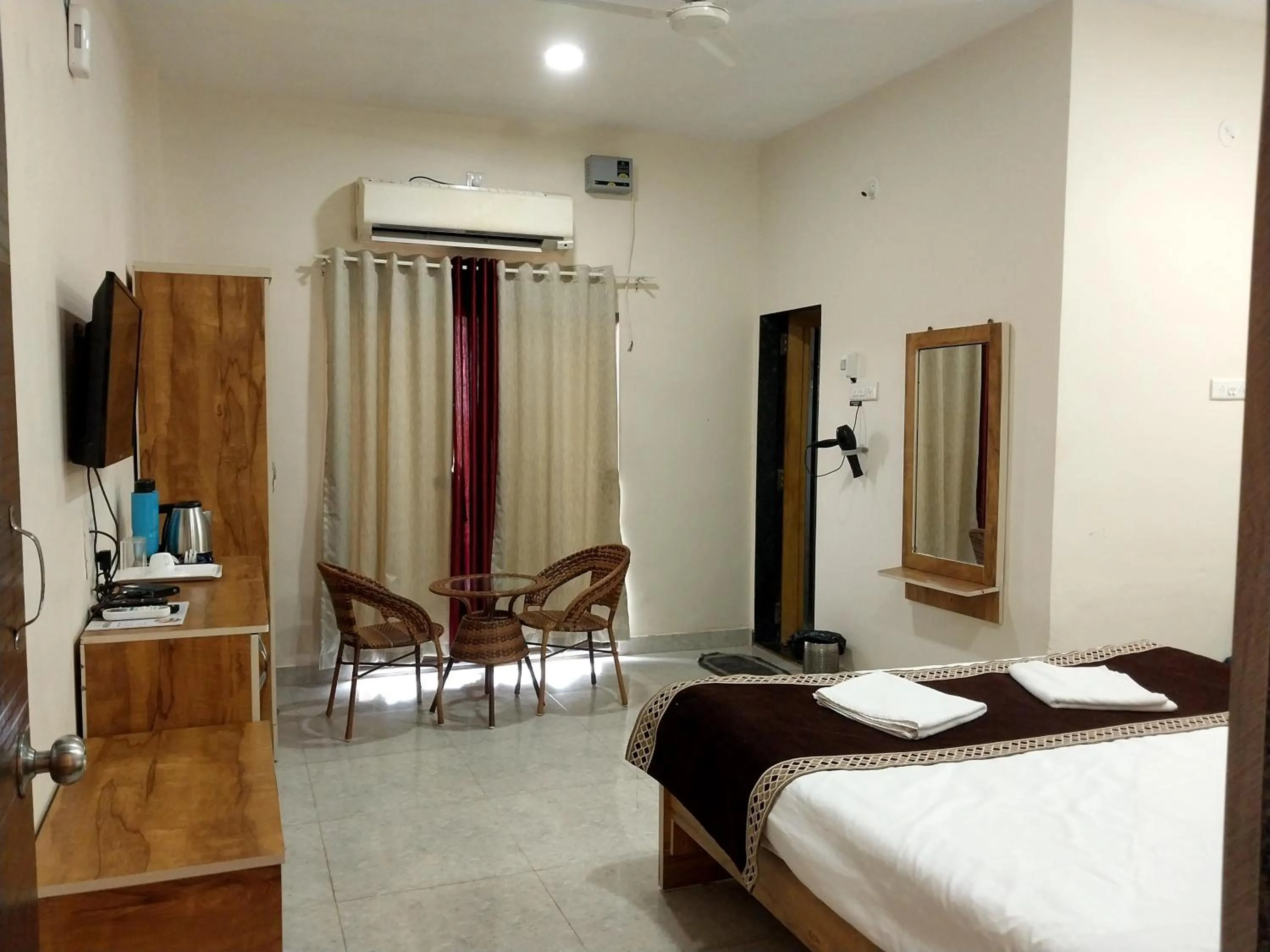 Photo of the whole room, Bed in Mango Valley Resort Ganpatipule
