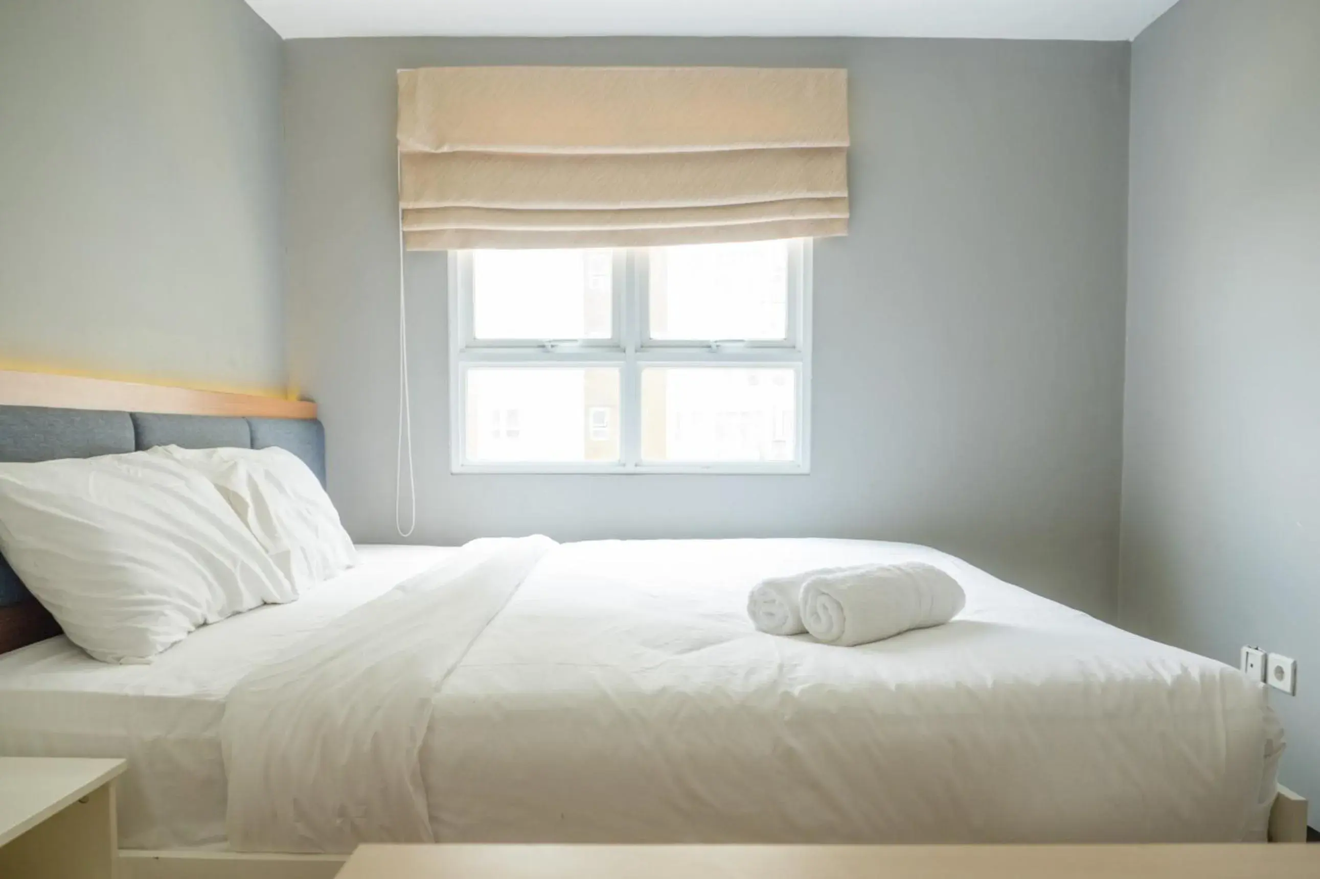 Bedroom, Bed in Pleasant 2BR Apartment at Gateway Pasteur By Travelio Bedroom, Bed in Pleasant 2BR Apartment at Gateway Pasteur By Travelio