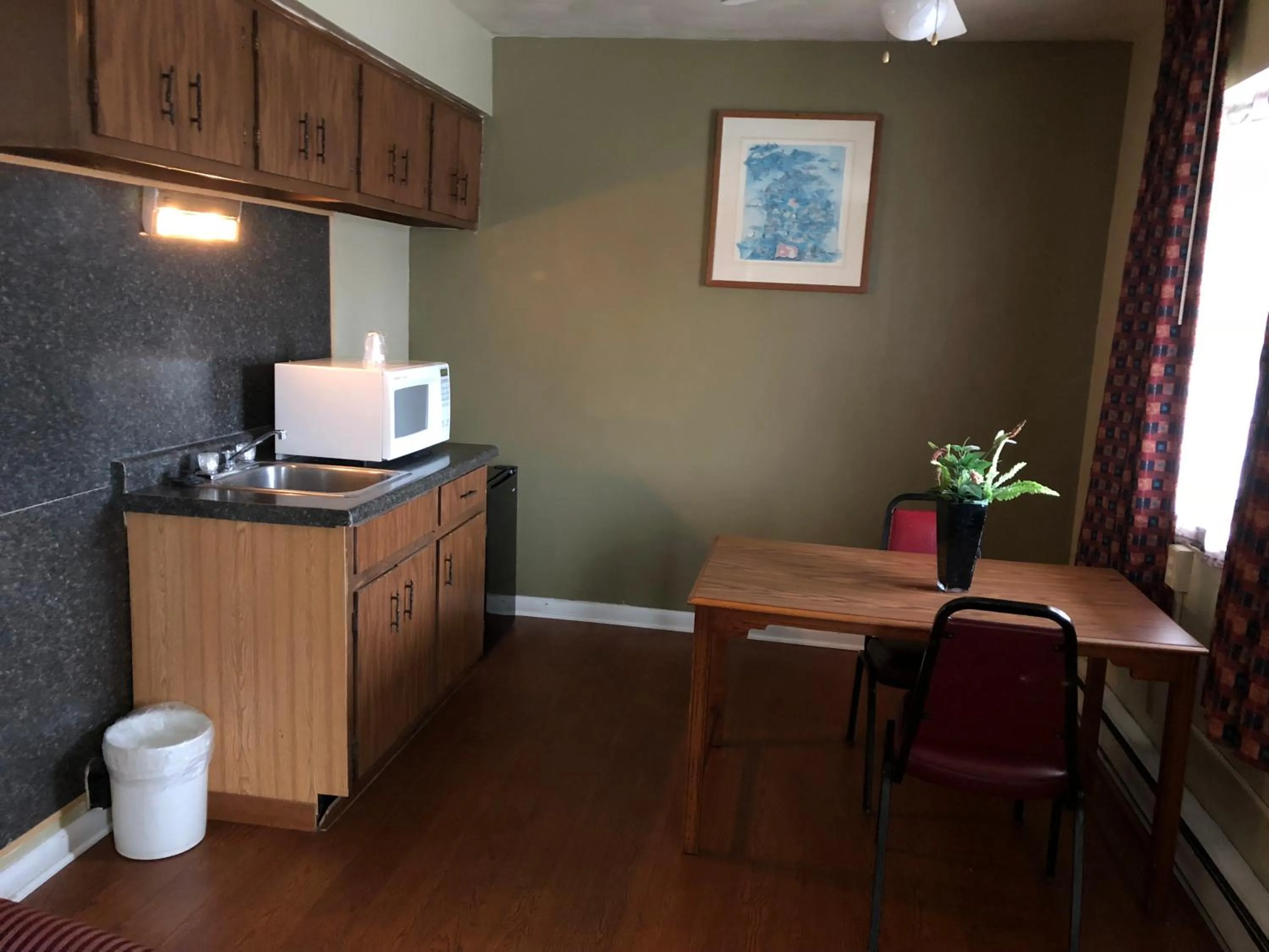 People in Village Inn Motel Holt