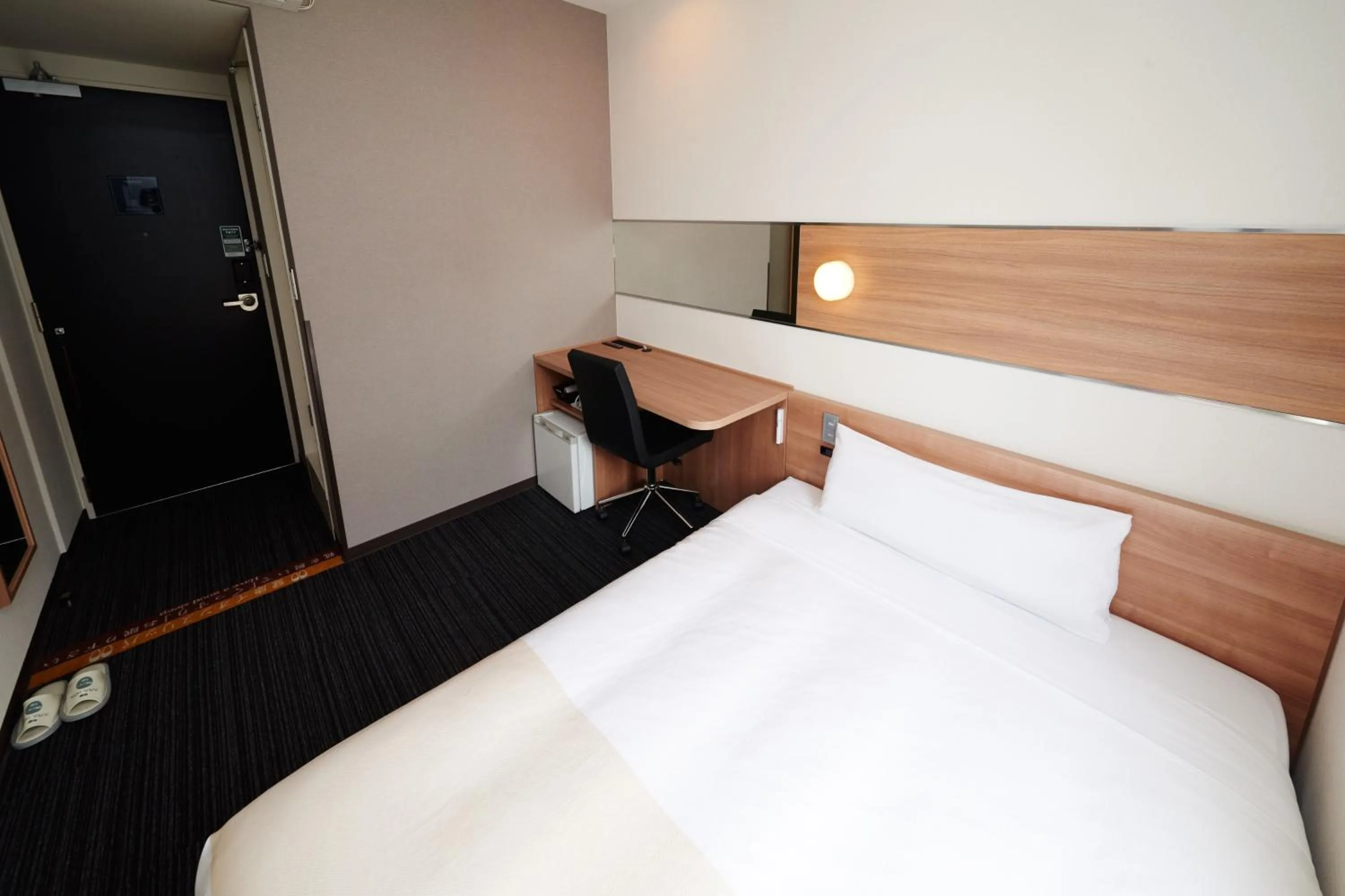 Photo of the whole room, Bed in Super Hotel Namba Nipponbashi