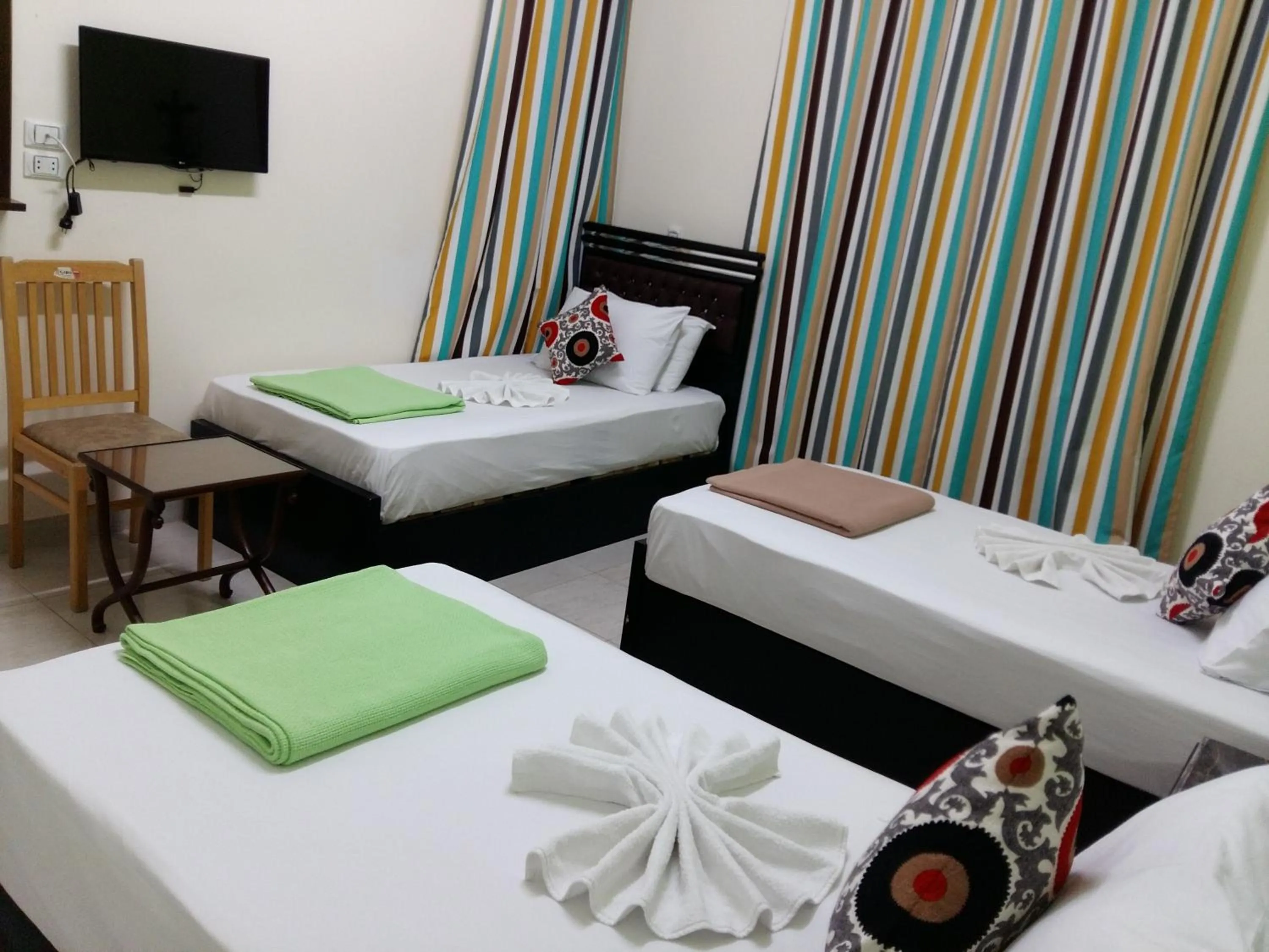 Triple Room with Private External Bathroom in Golden Star Hostel