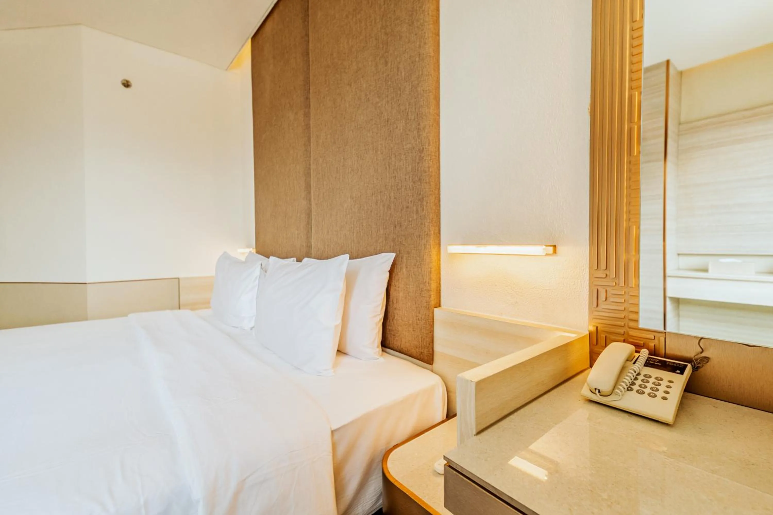 Bed in Gino Feruci Braga by KAGUM Hotels