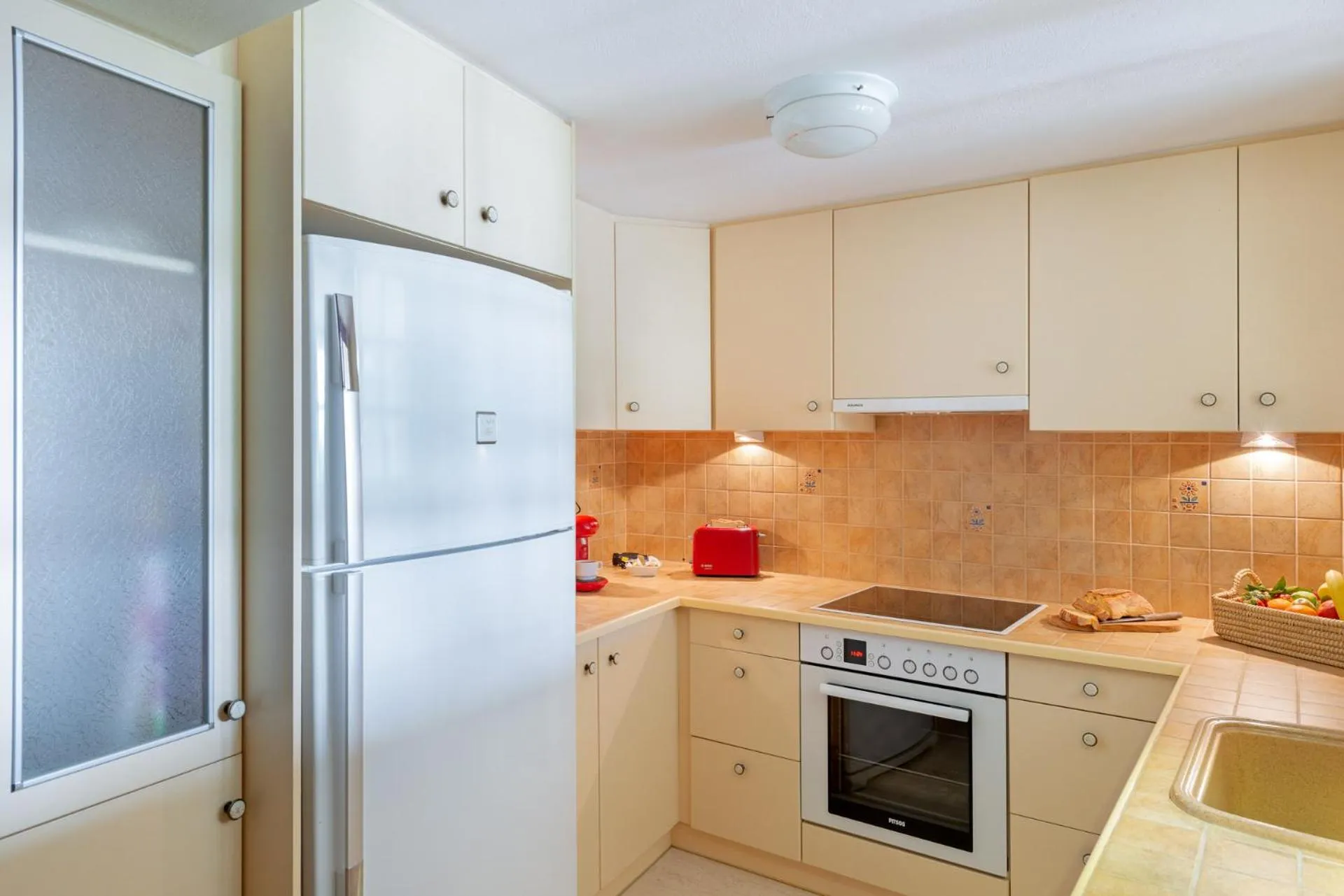 Kitchen or kitchenette in Europe Hotel