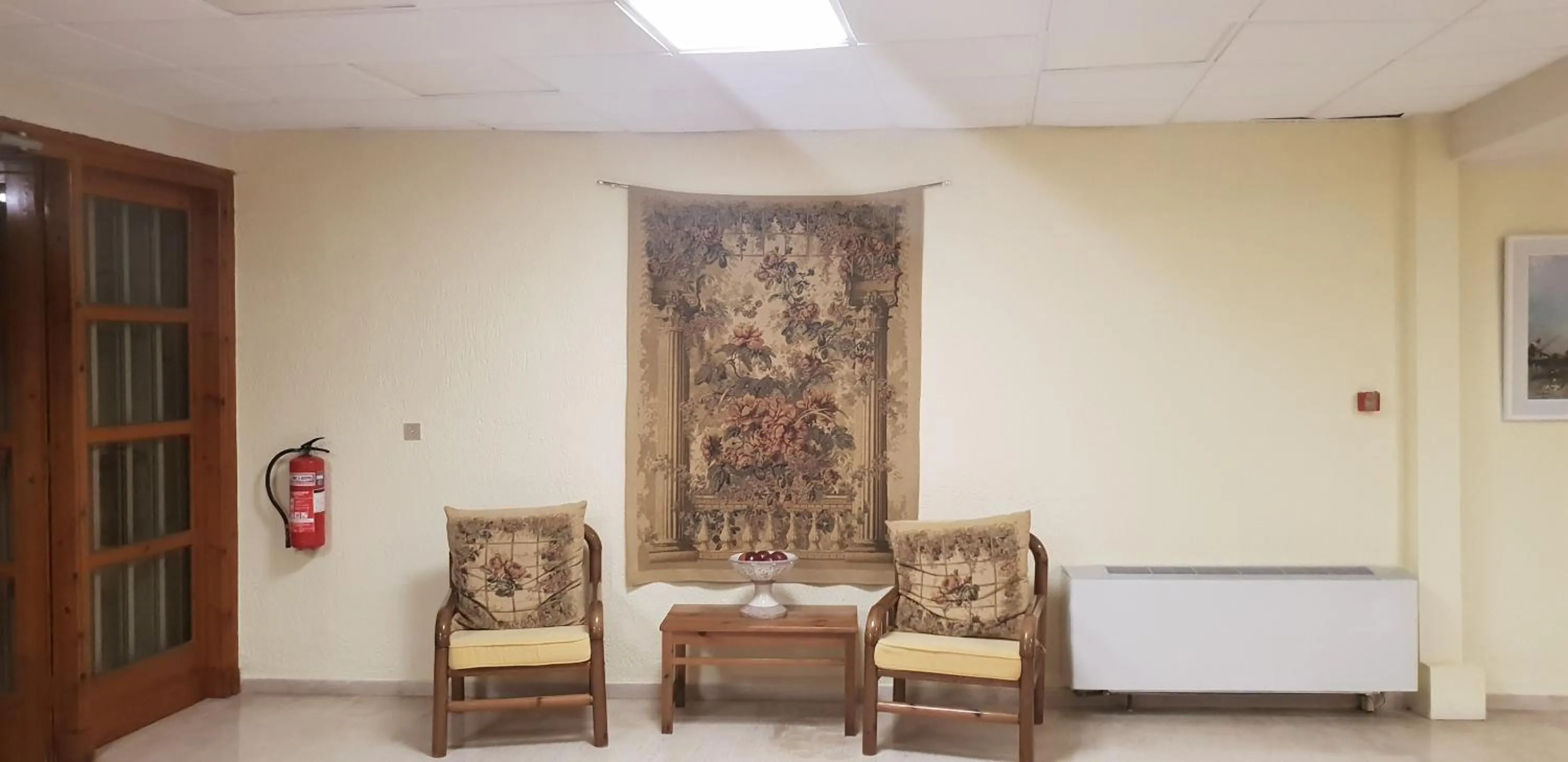 Communal lounge/ TV room in Europe Hotel