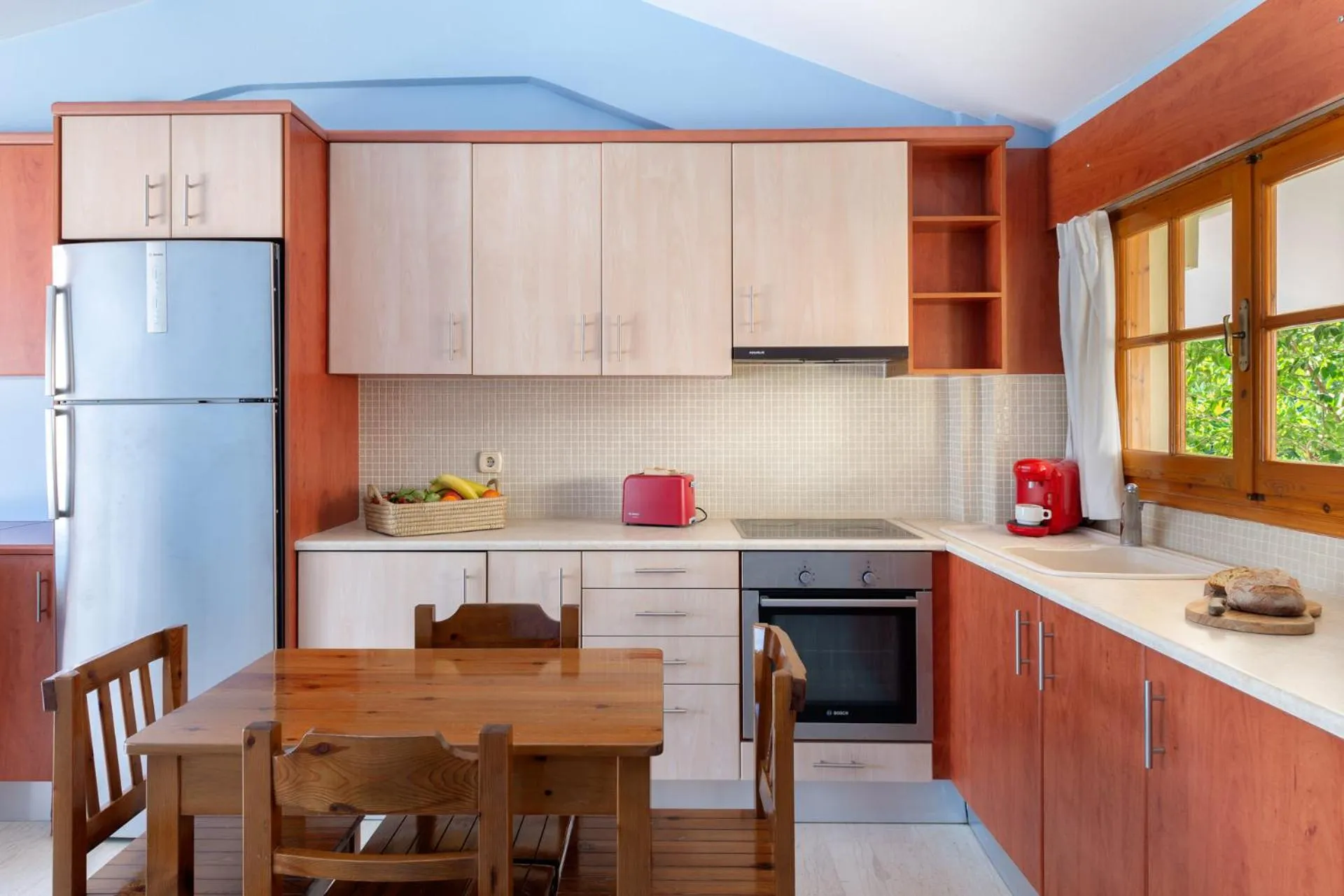 Kitchen or kitchenette in Europe Hotel