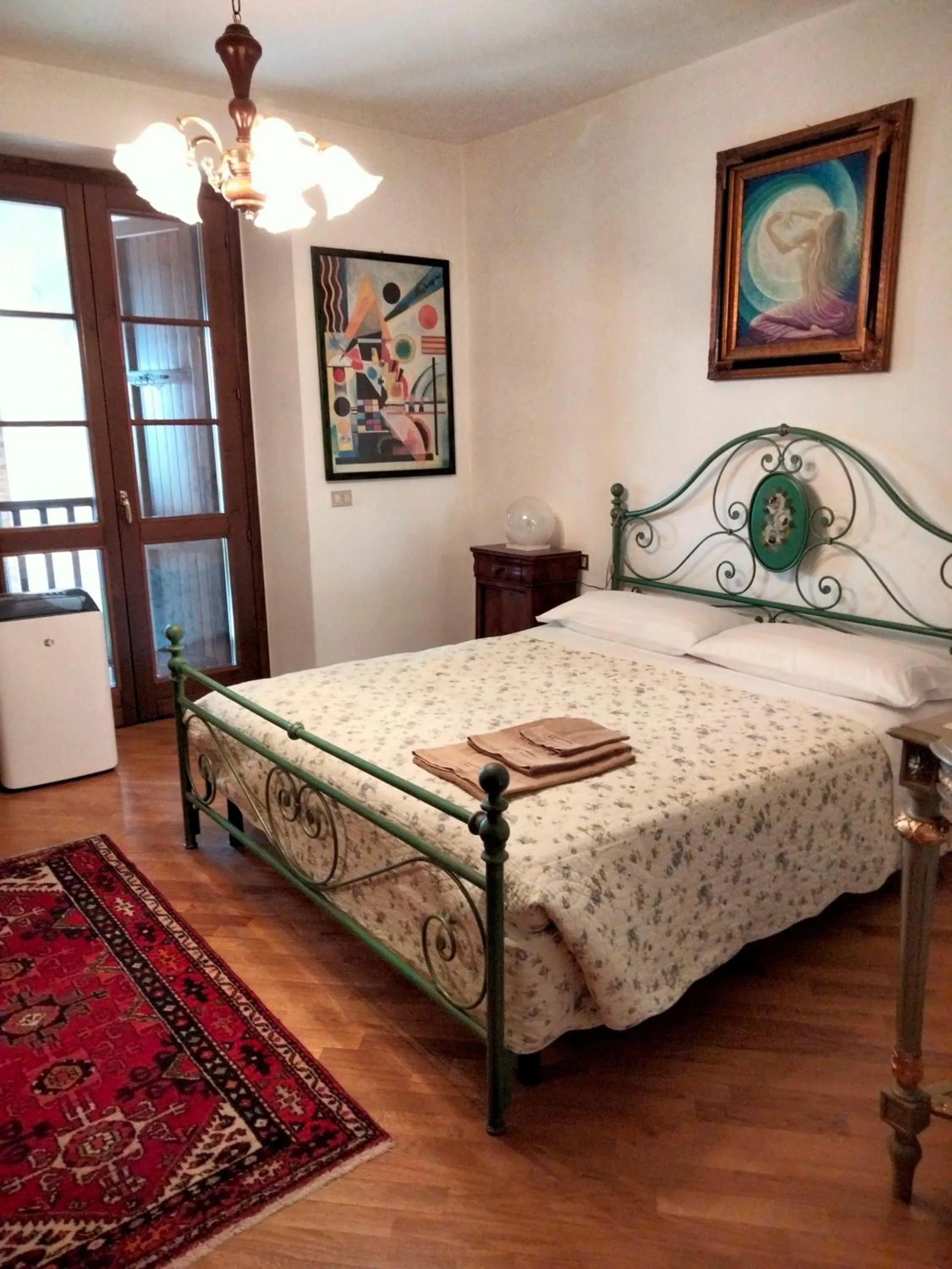 Bed in B&B Cascina in Franciacorta