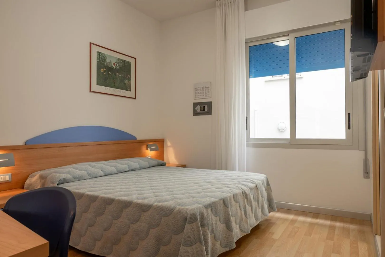 Bed in Hotel Riviera