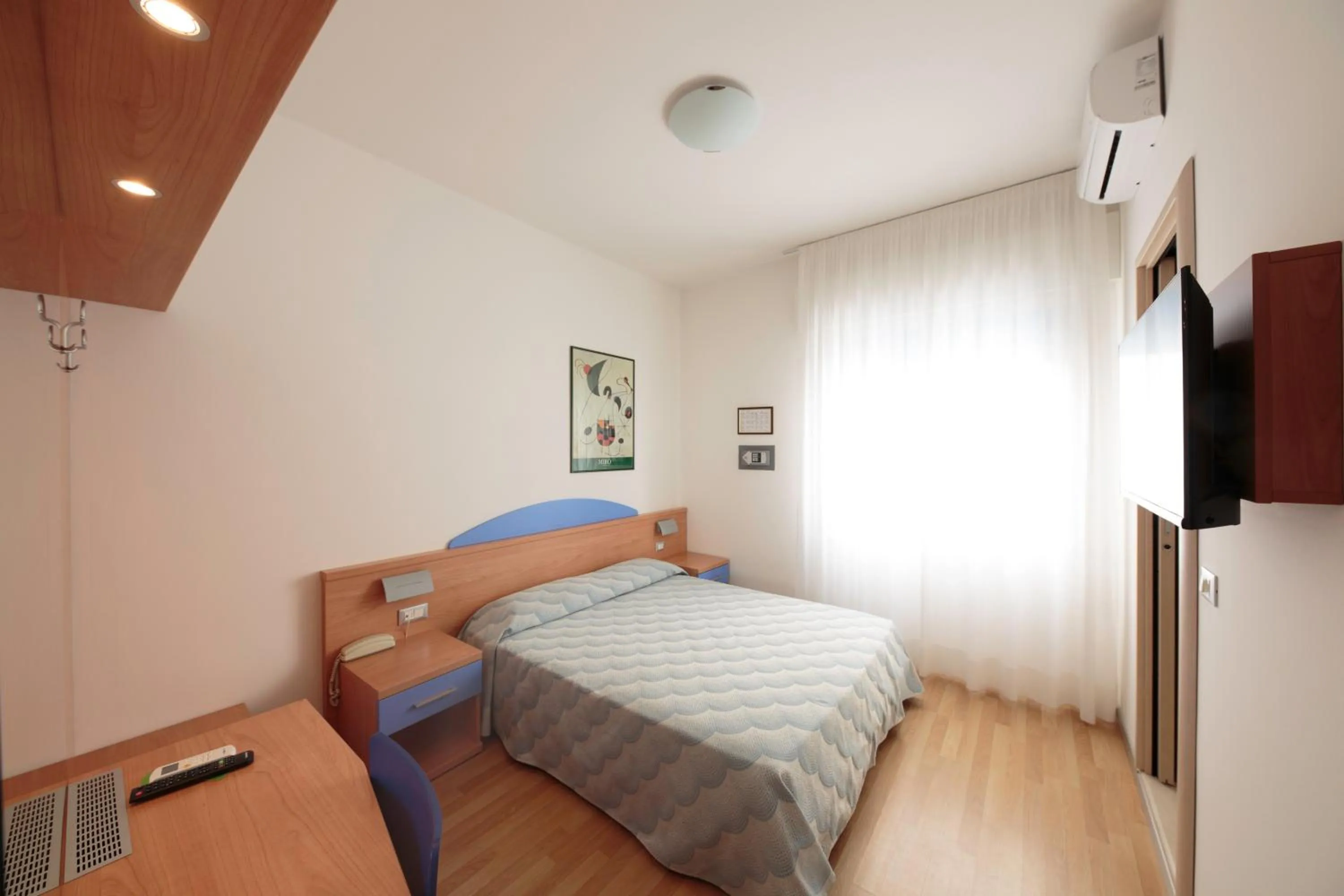 Bed in Hotel Riviera