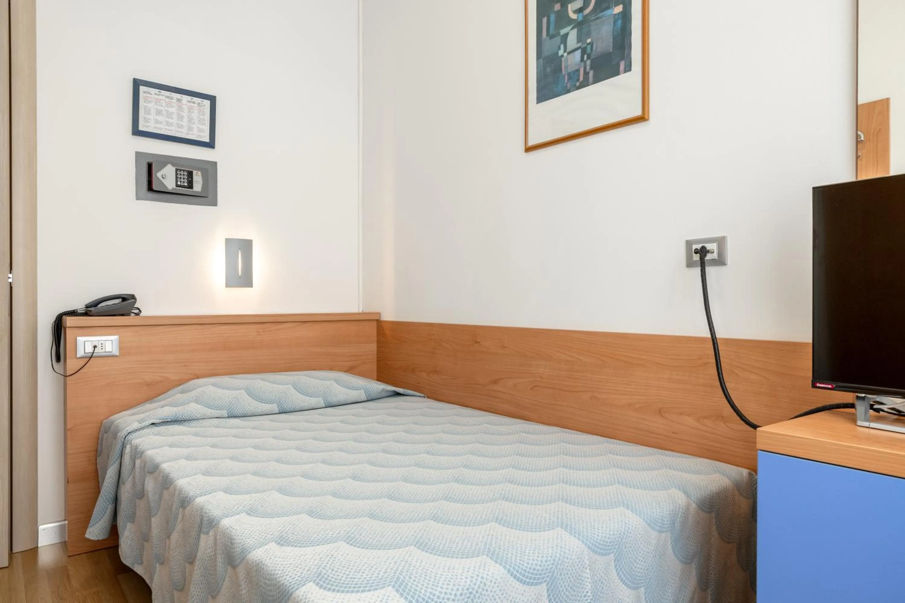 Bed in Hotel Riviera