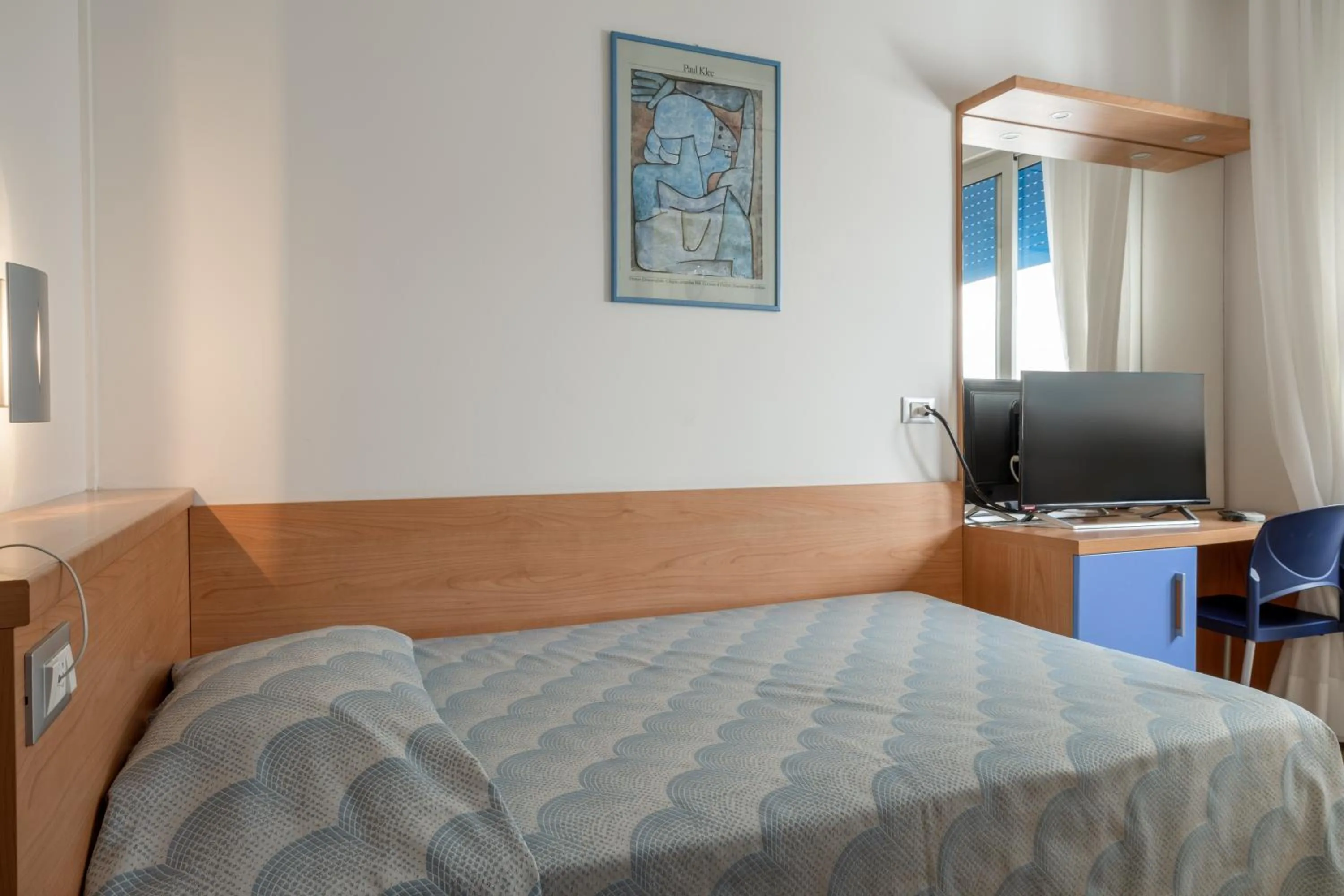 Bed in Hotel Riviera