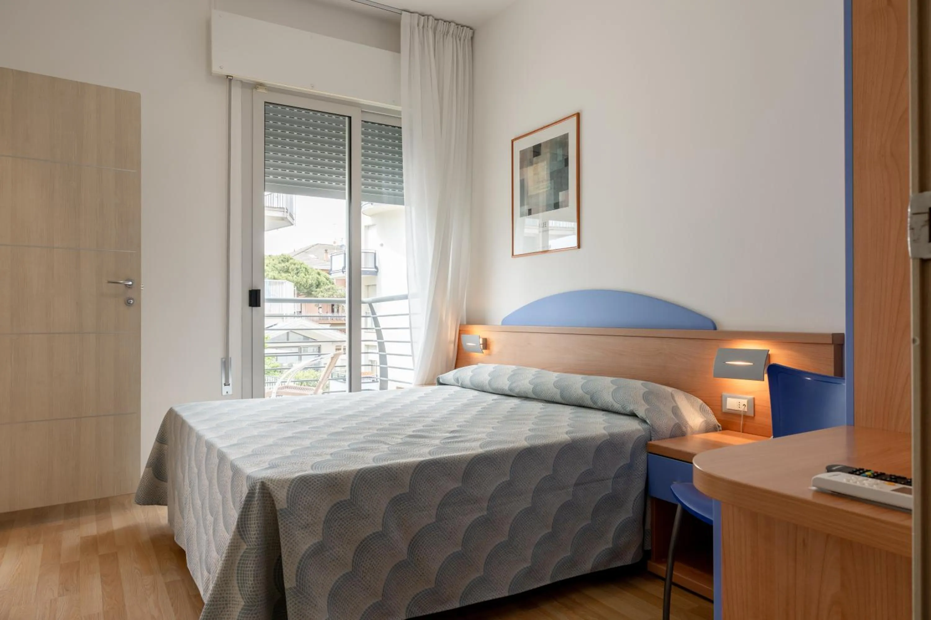 Bed in Hotel Riviera