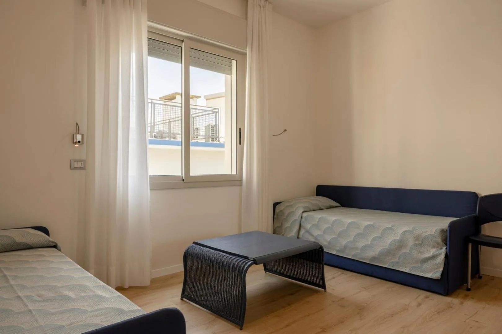 Bed in Hotel Riviera