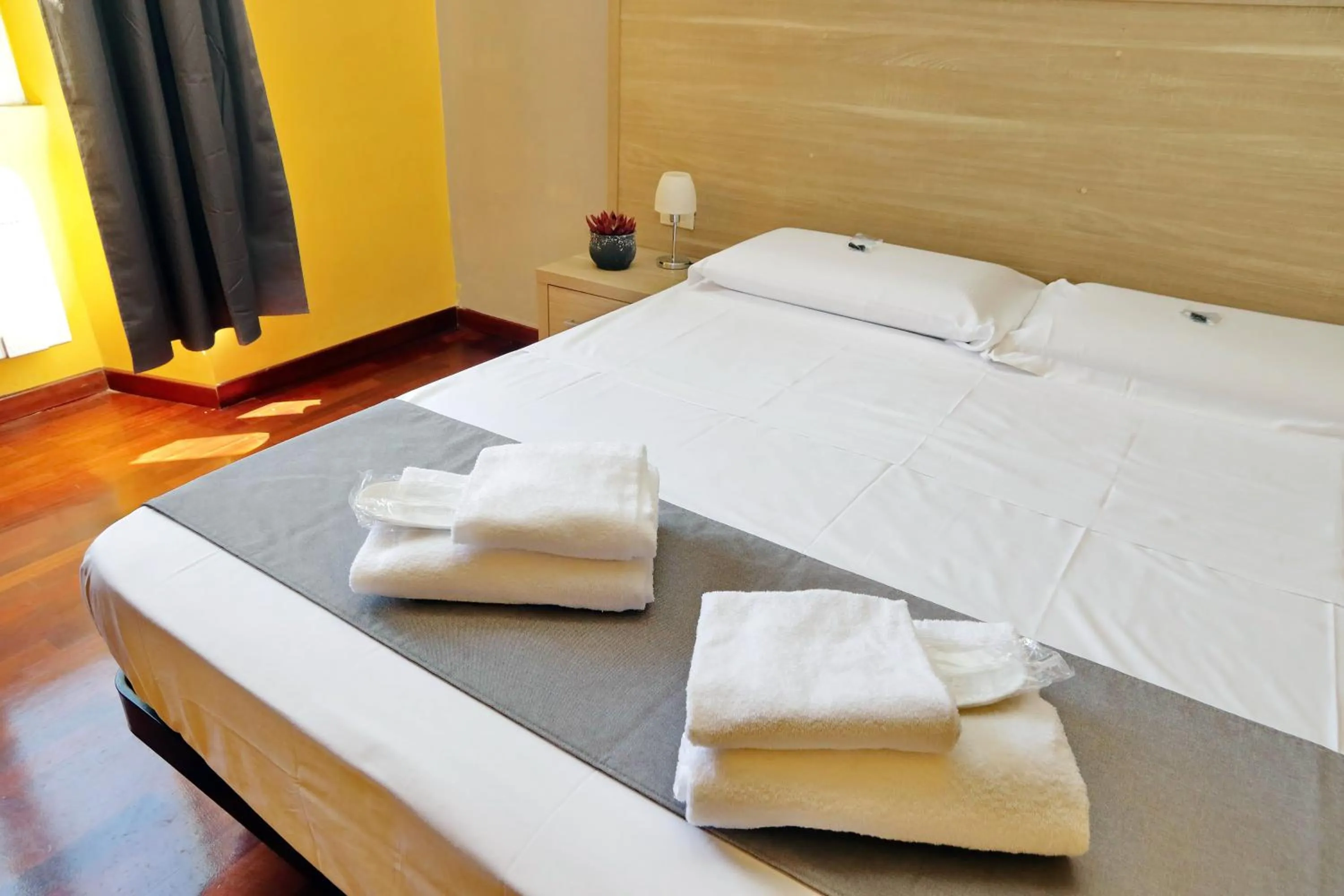 Bed in LHG Comfy Rooms