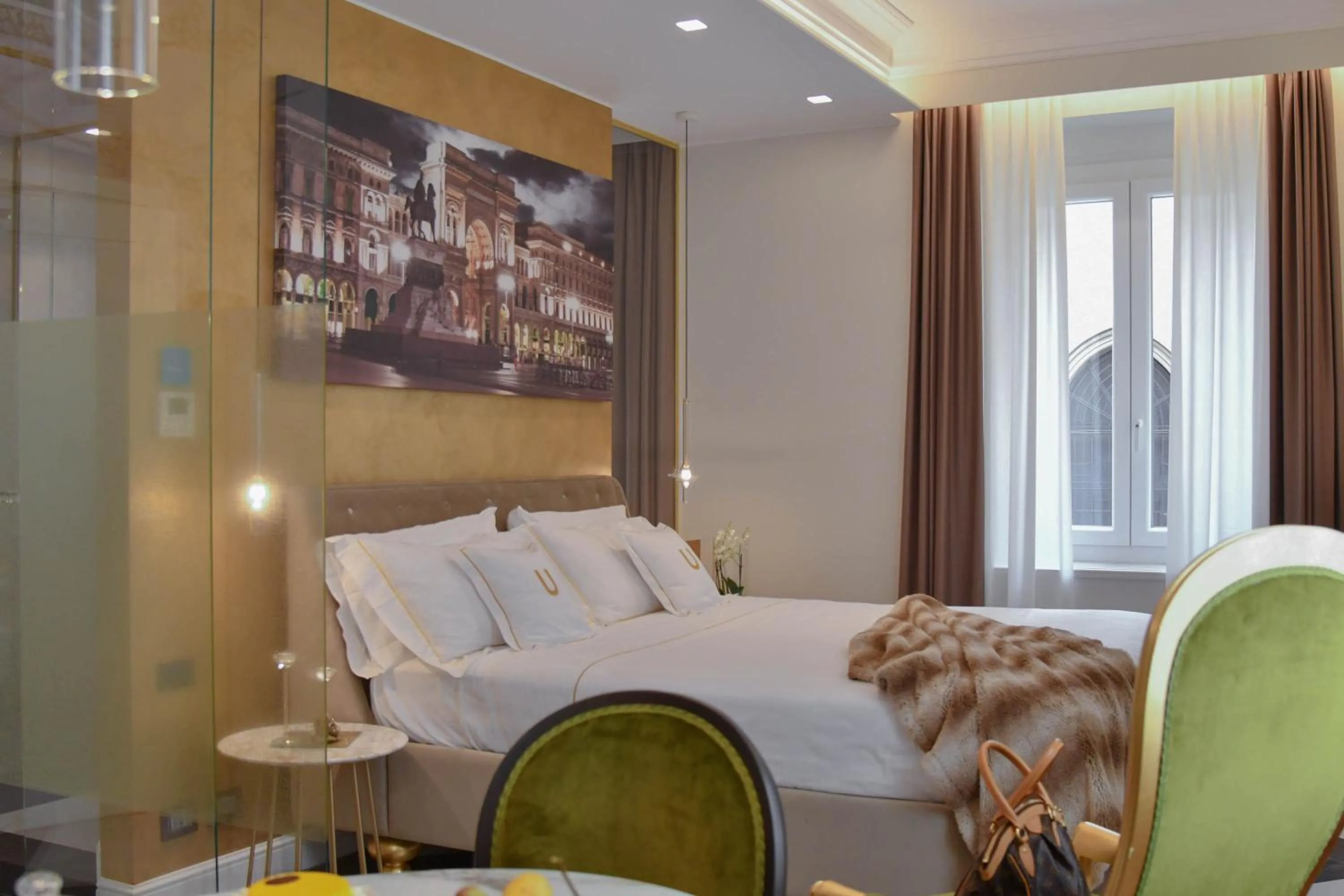 Bed in The Unique Brera Suites