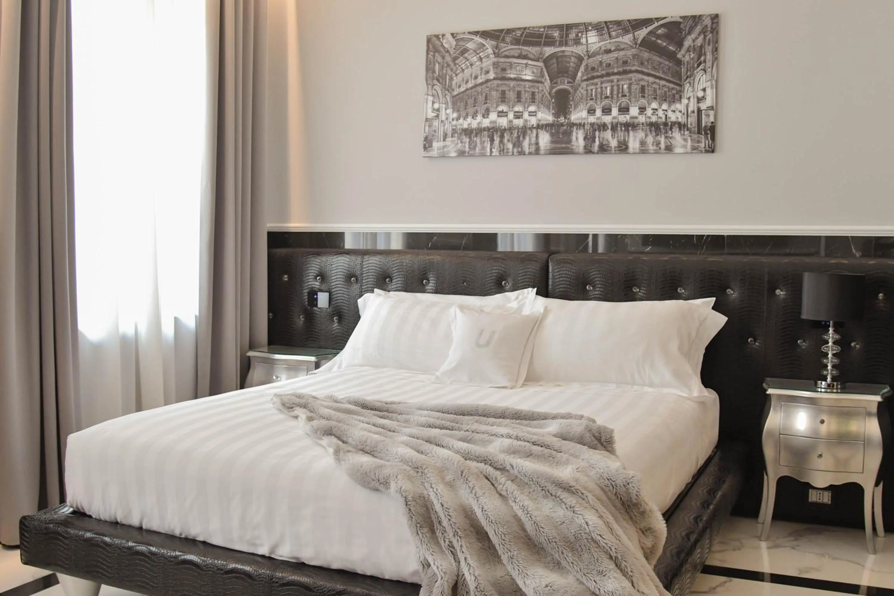 Bed in The Unique Brera Suites