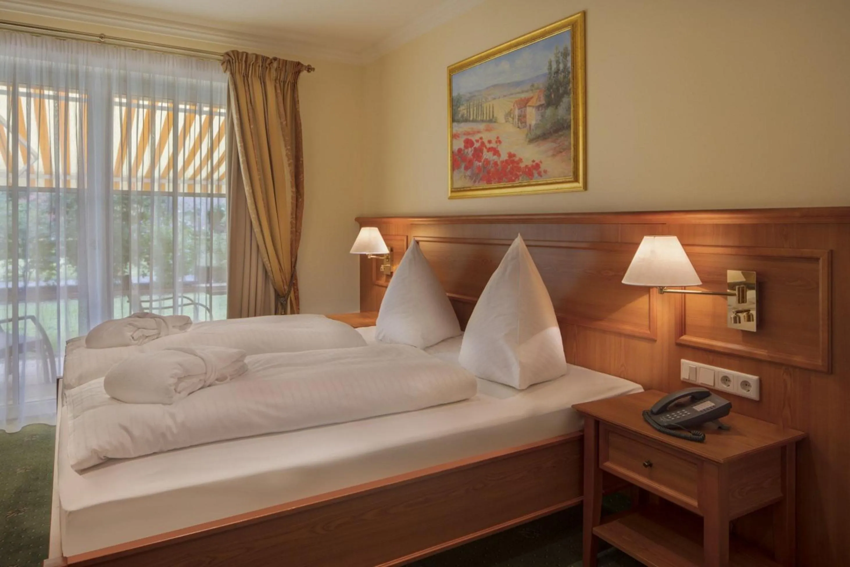 Photo of the whole room, Bed in Hotel Schweizer Hof Thermal und Vital Resort