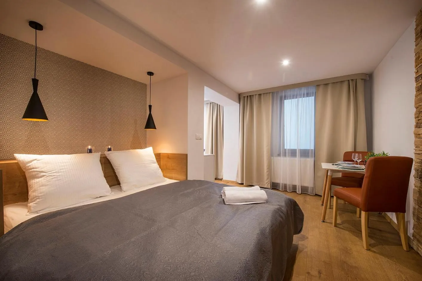 Dining area, Bed in Villa Bellevue Wellness