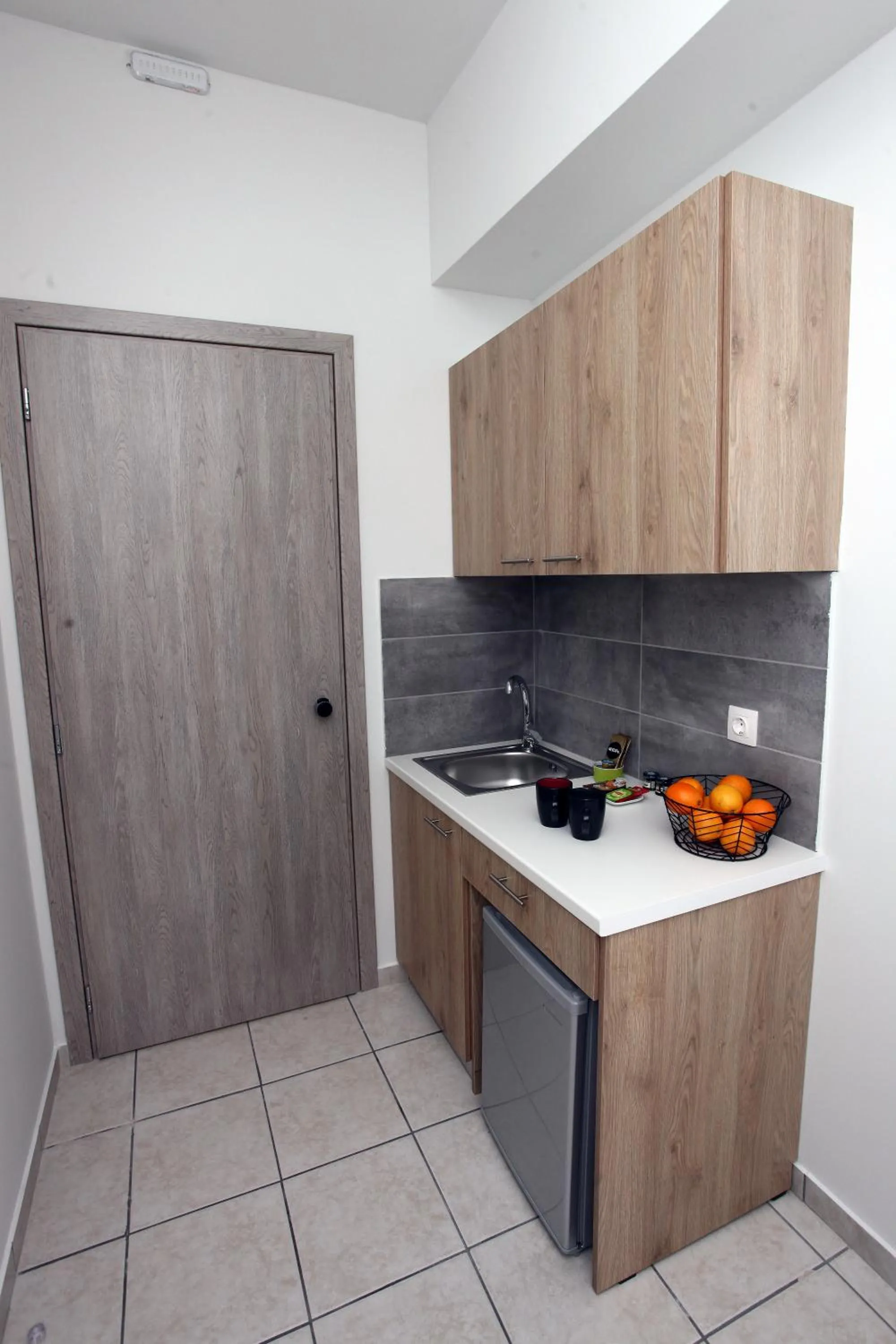 Kitchen or kitchenette in Old Town Hall Suites and Apartments