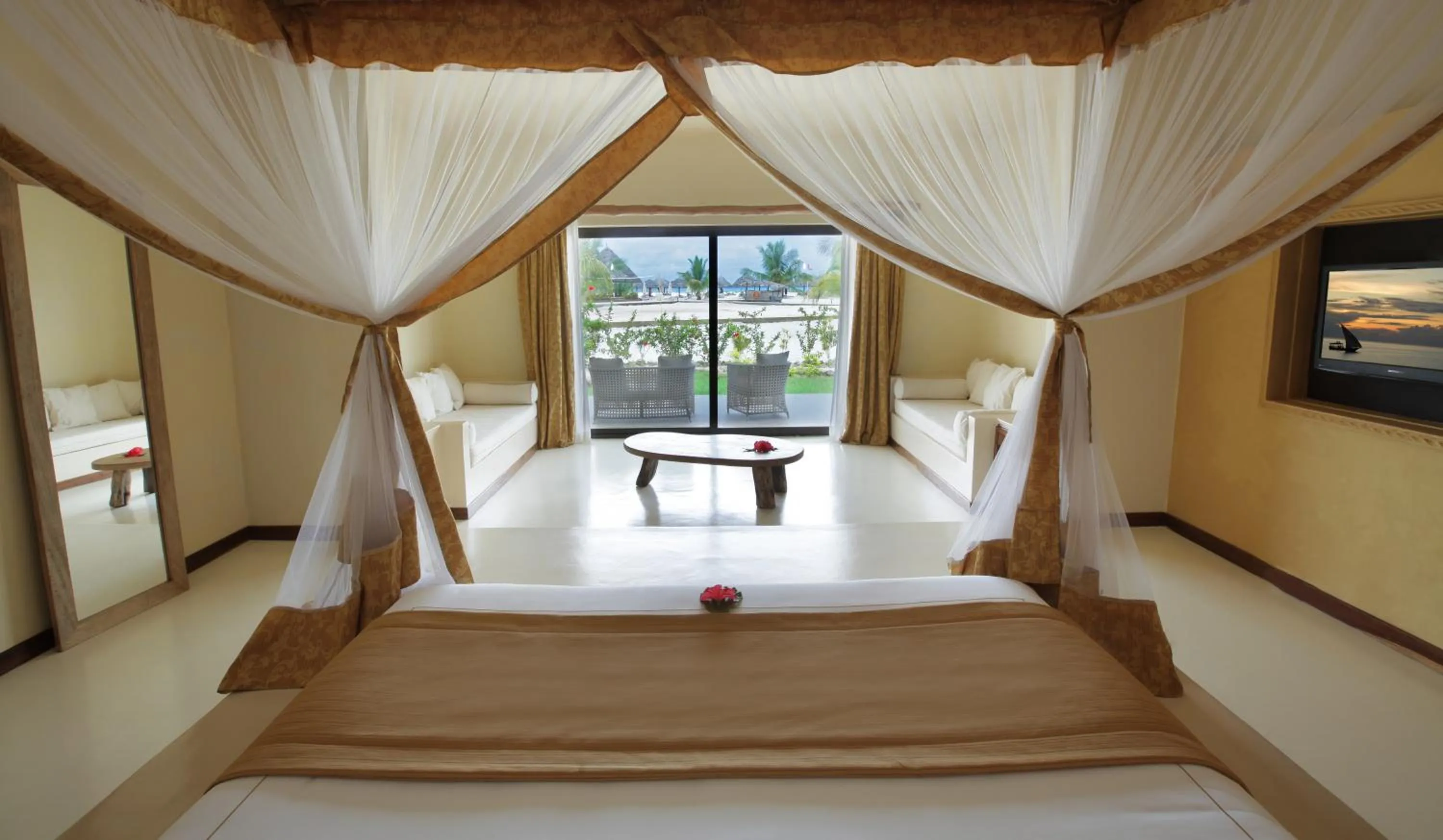 Bed in Gold Zanzibar Beach House & Spa