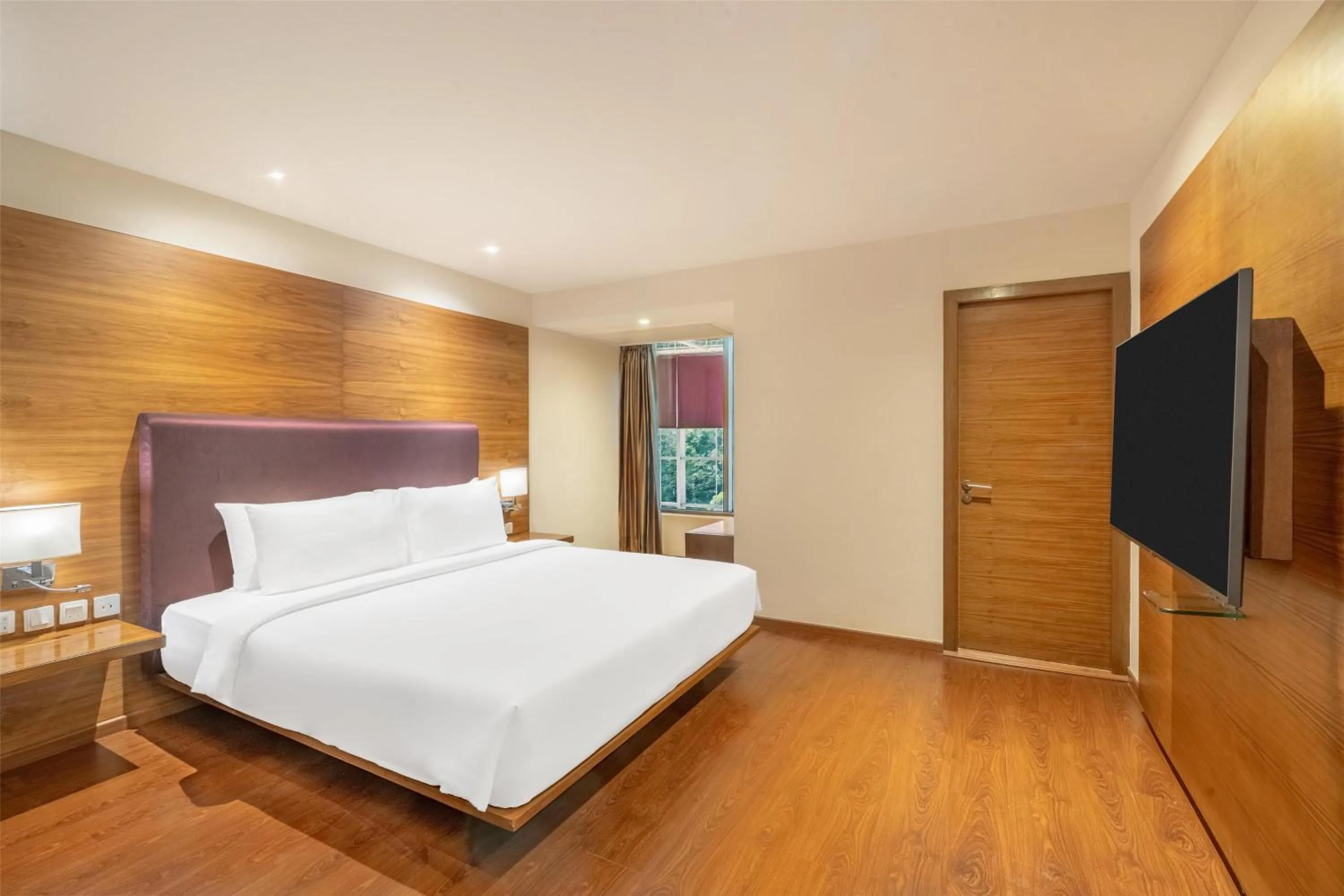 Photo of the whole room, Bed in Radisson Blu Plaza Hotel Hyderabad Banjara Hills