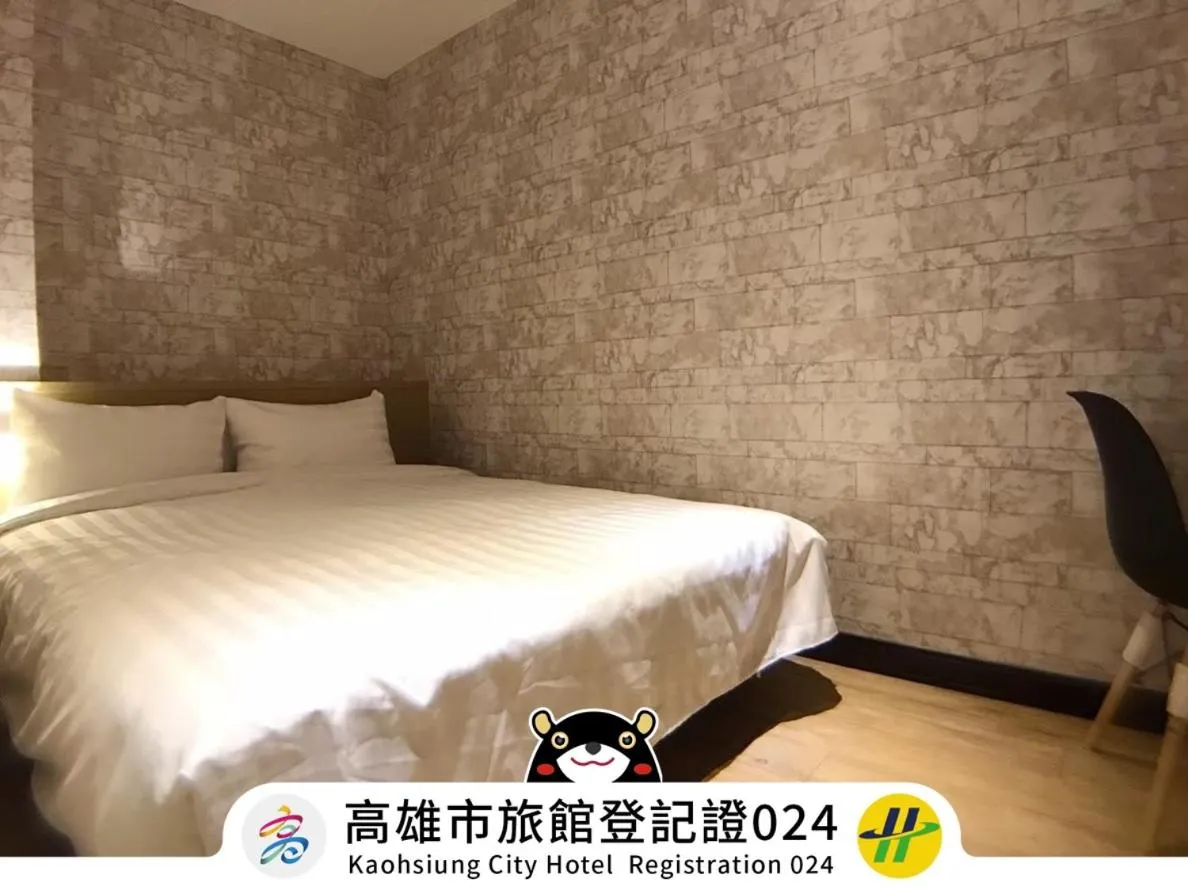 Bed in Win Inn Kaohsiung Hotel