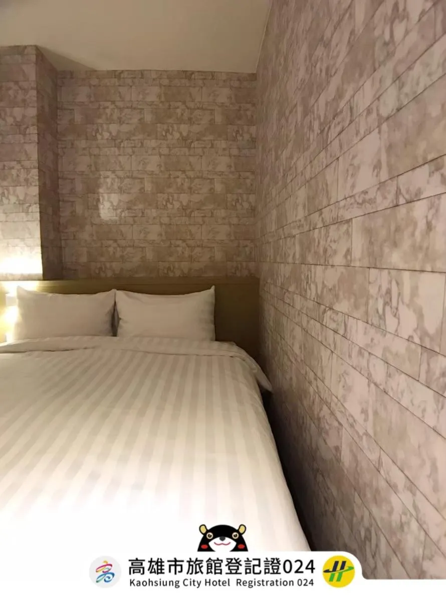 Bed in Win Inn Kaohsiung Hotel