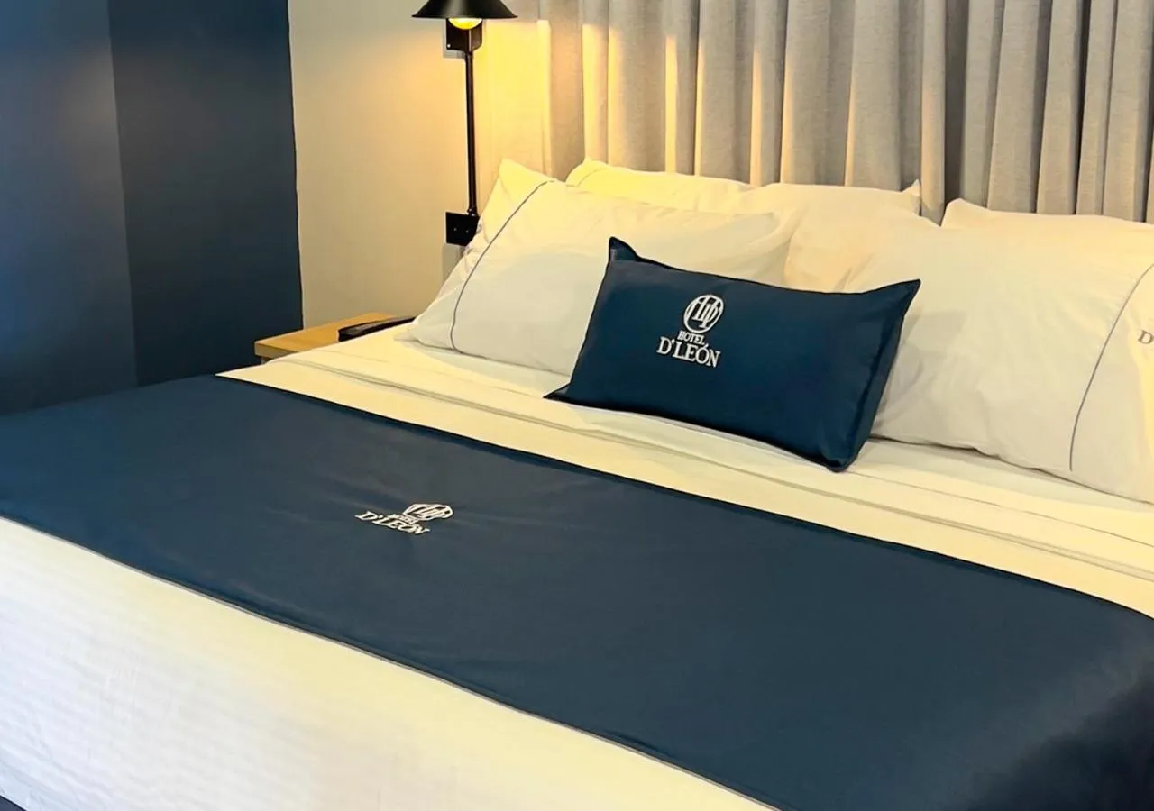 Property building, Bed in Hotel D' Leon