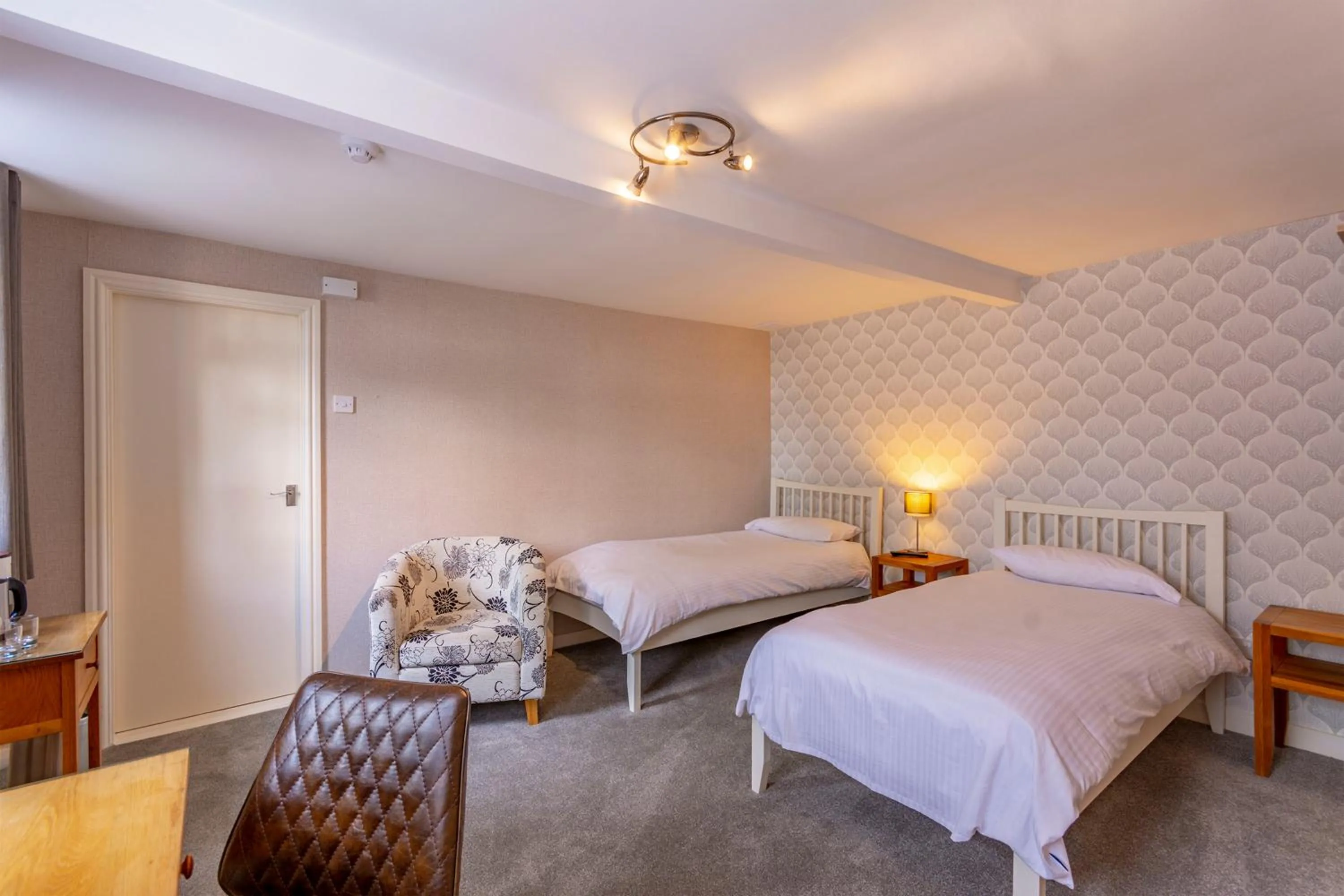 Bed in Woodcote Hotel