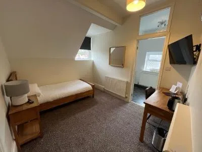 Bed in Woodcote Hotel