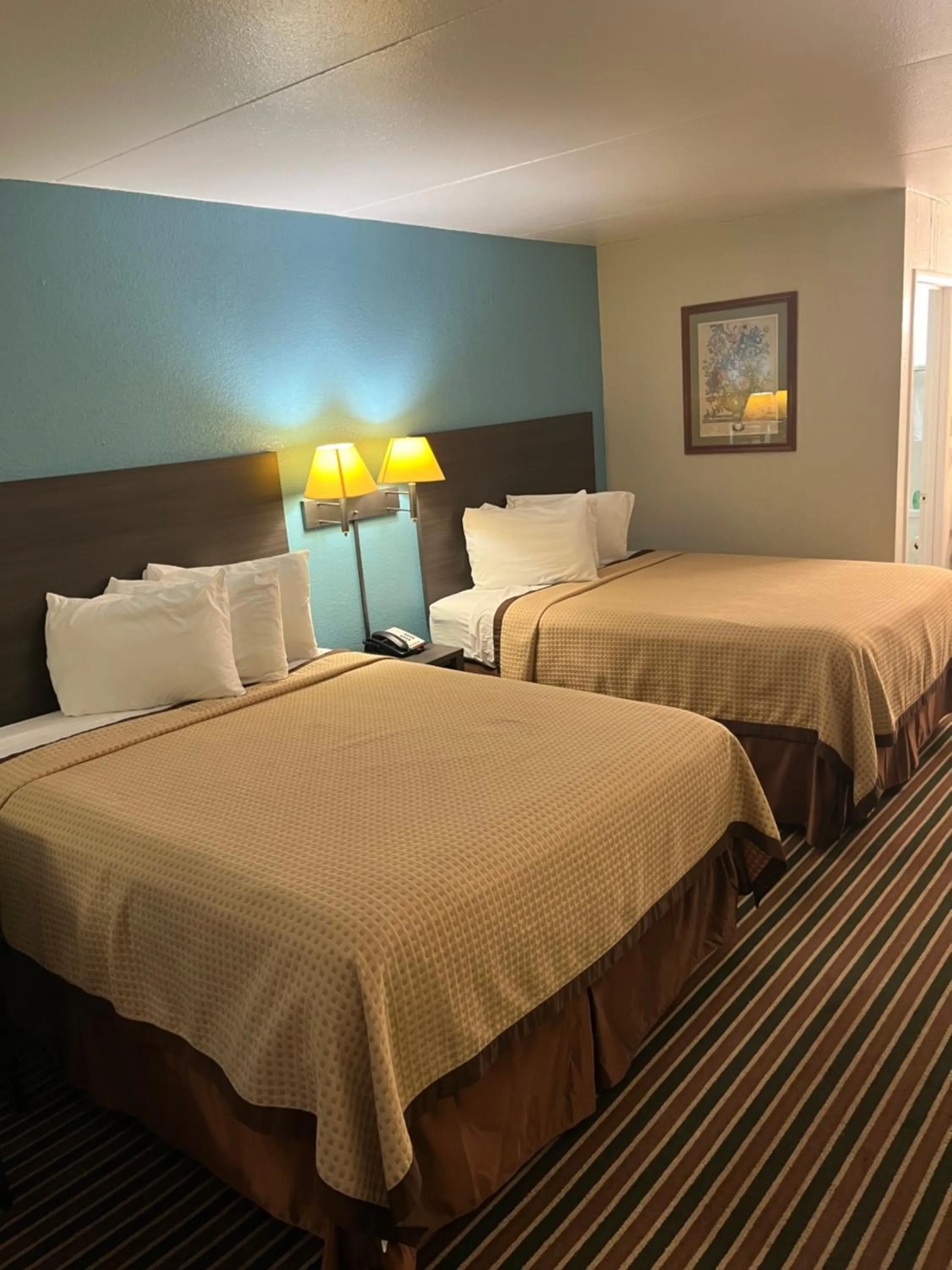 Bed in American Inn Morrilton