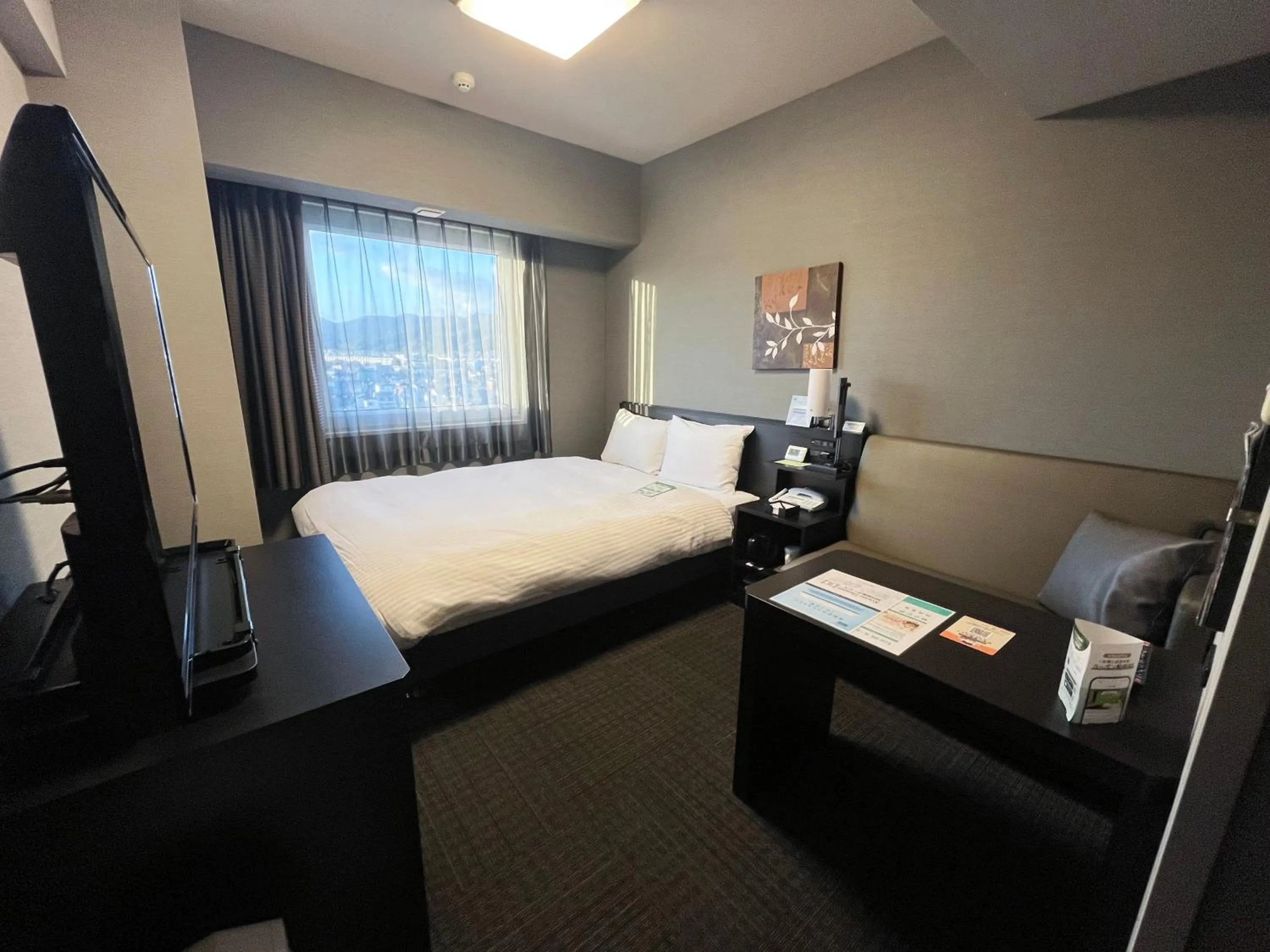 Photo of the whole room, Bed in Hotel Route Inn Kasai Hojonoshuku